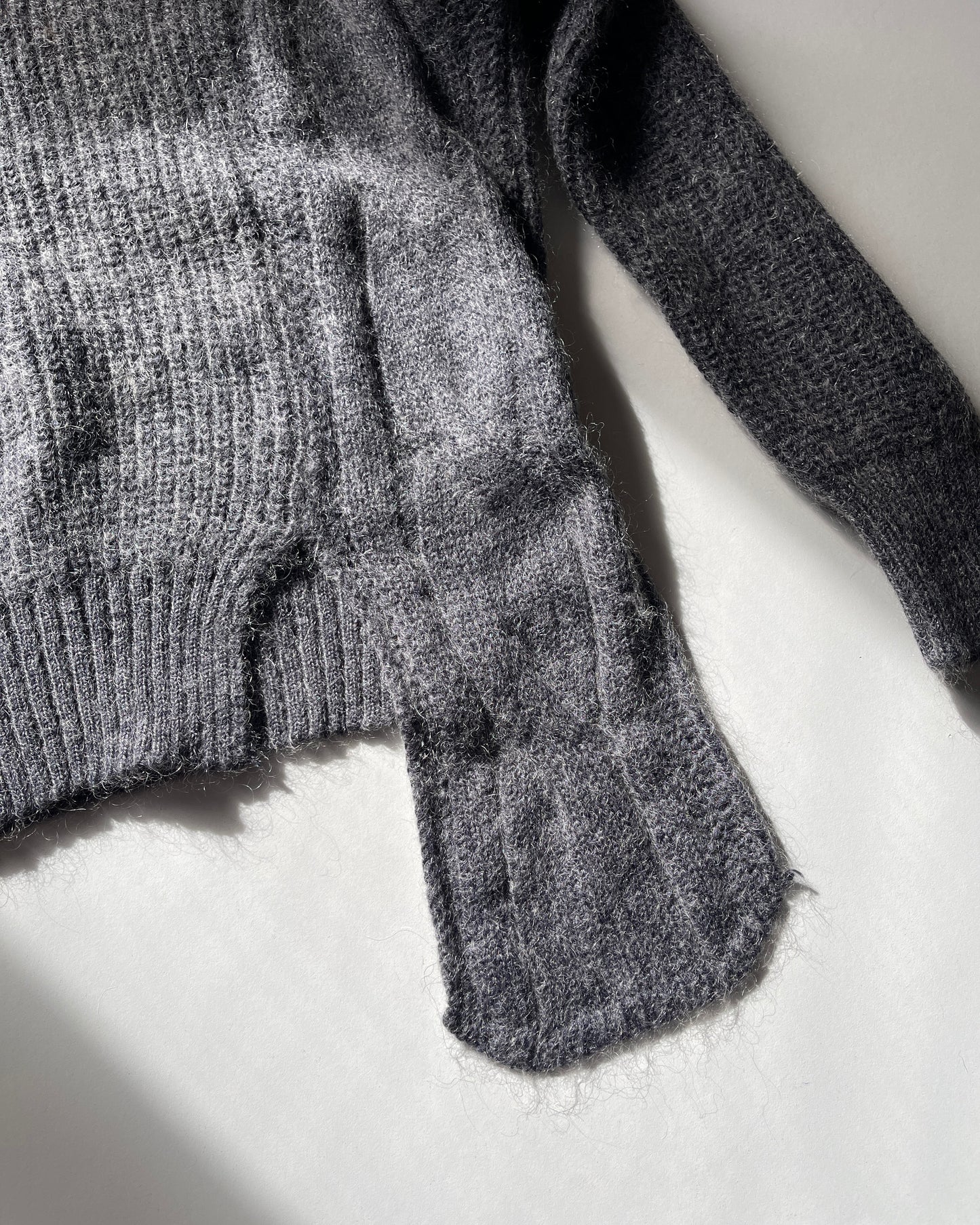 Asymmetric knit sweater