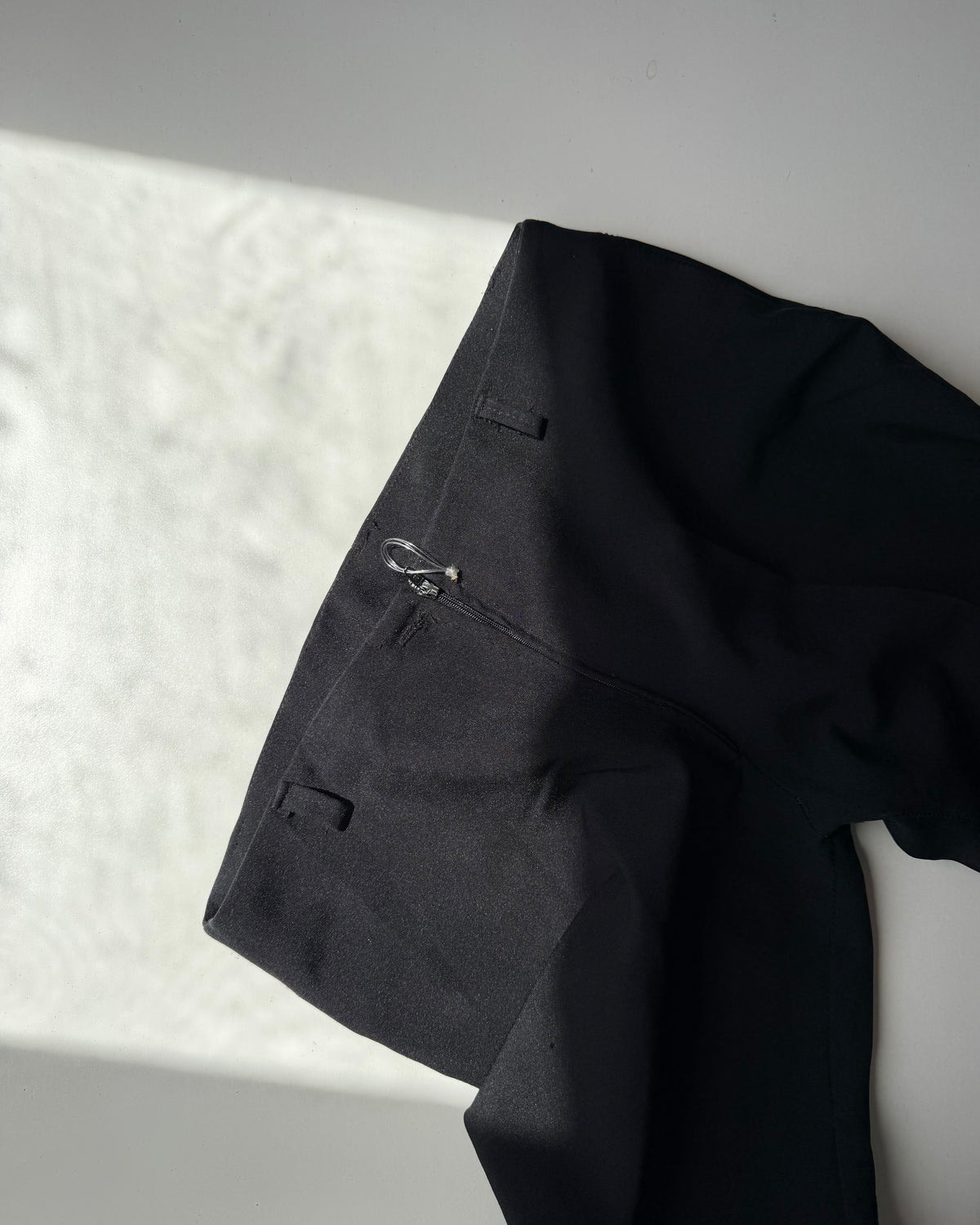Minimal black kickflare trousers