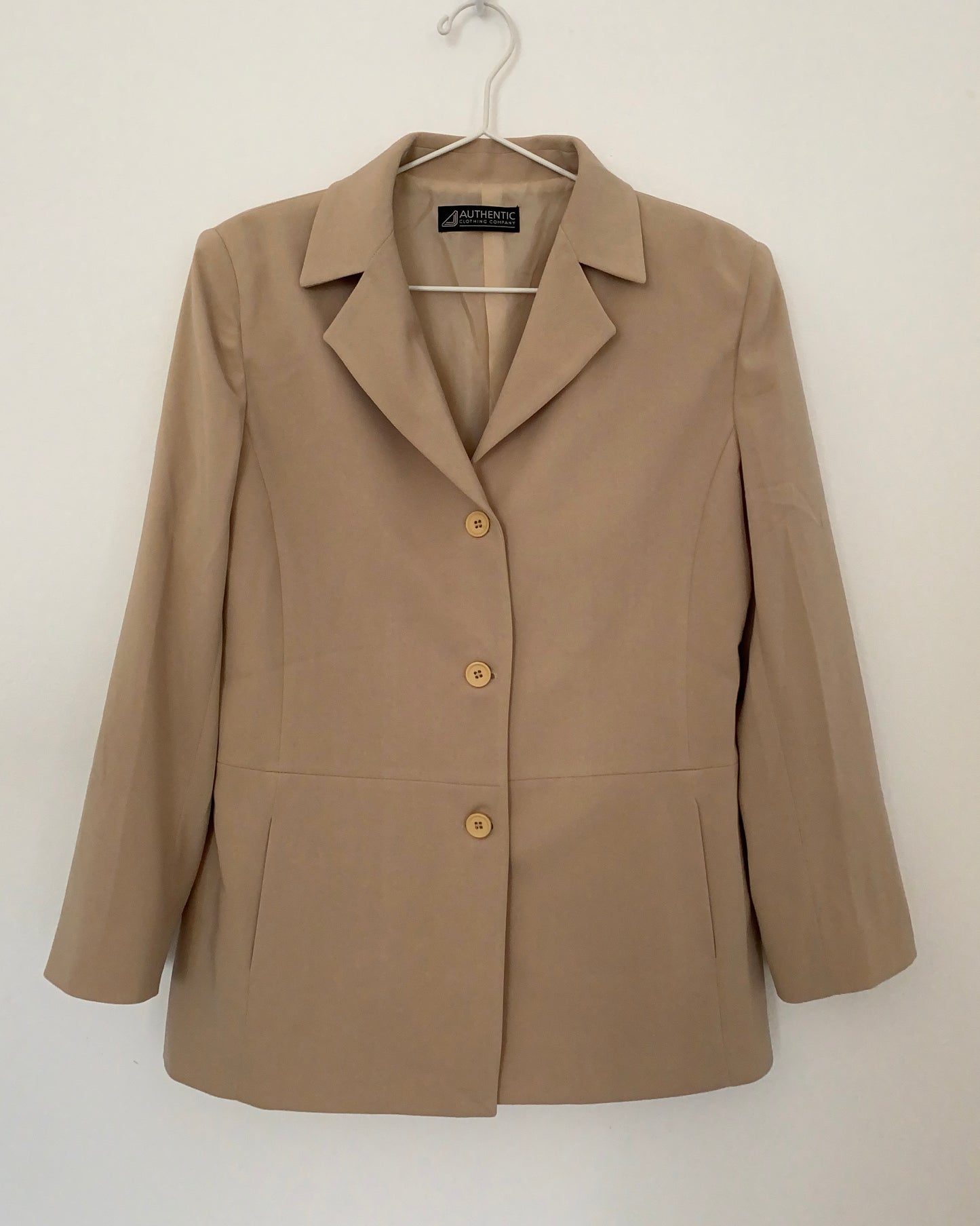 The beige blazer