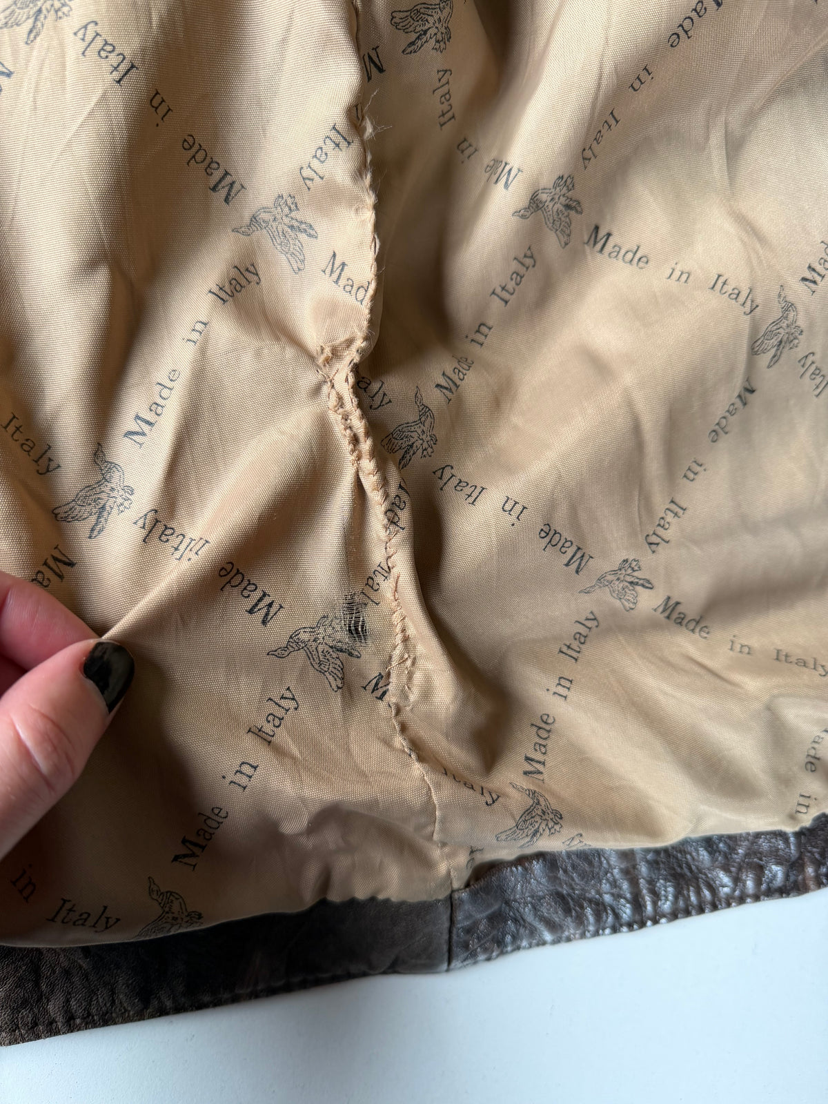 Distressed leather jacket
