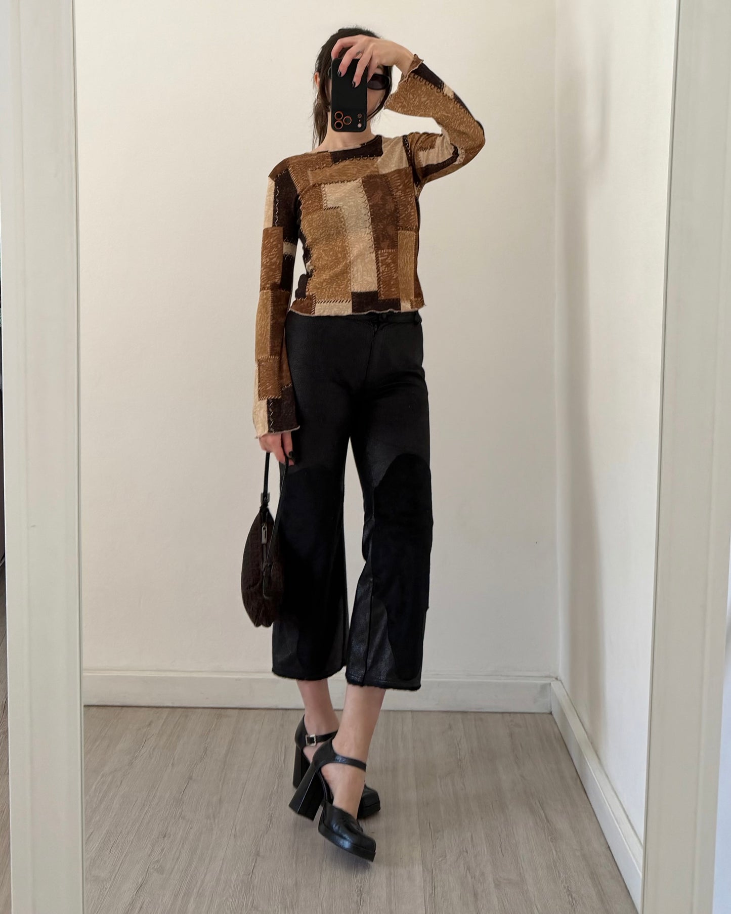Black faux leather trousers