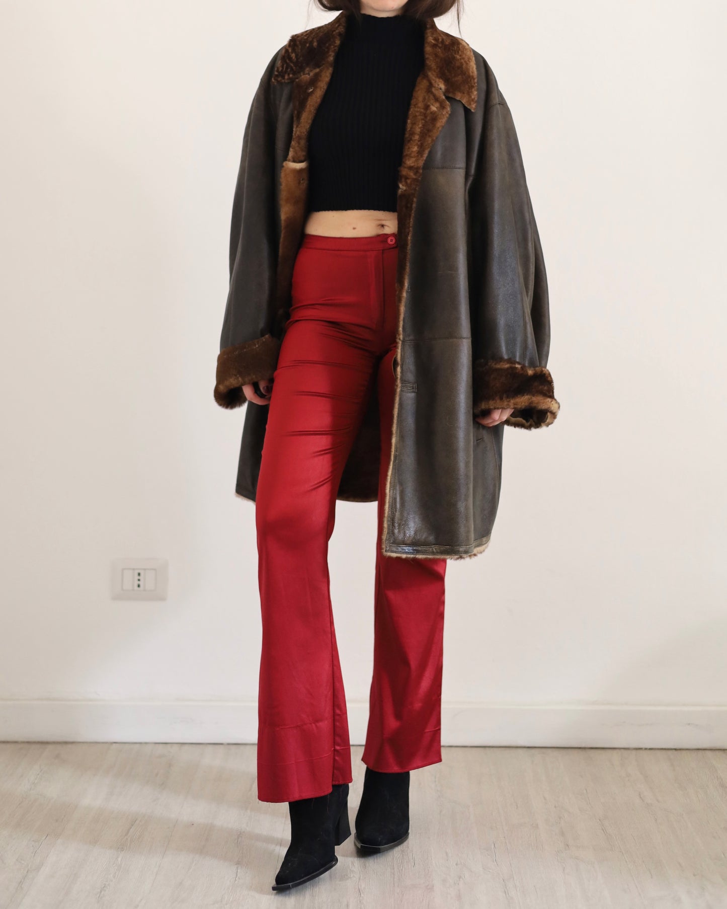 Red satin flare trousers