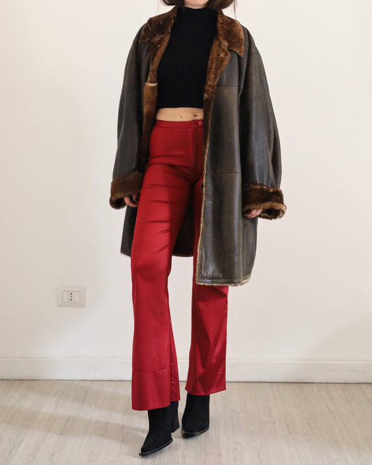 Red satin flare trousers