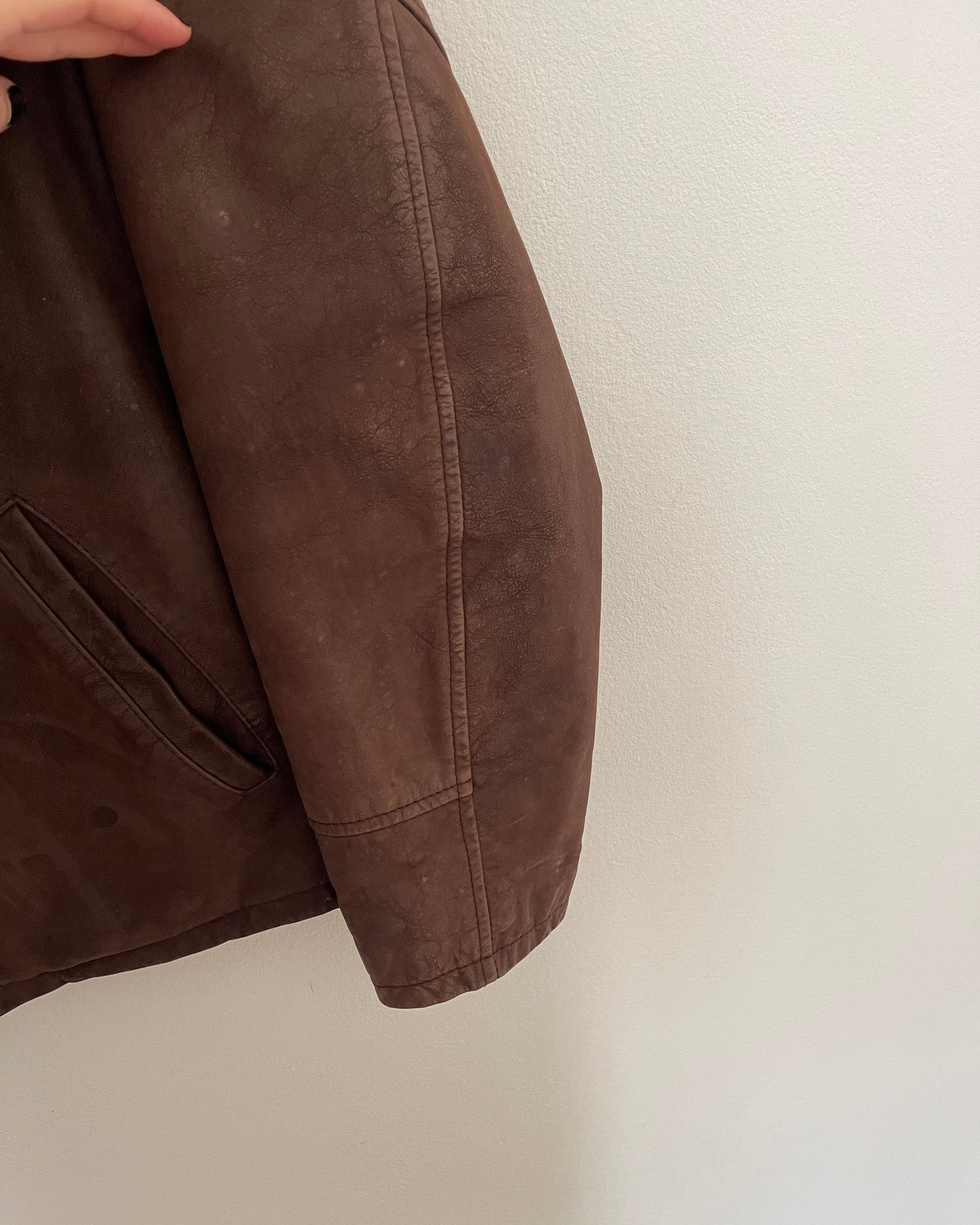Brown leather bomber jacket