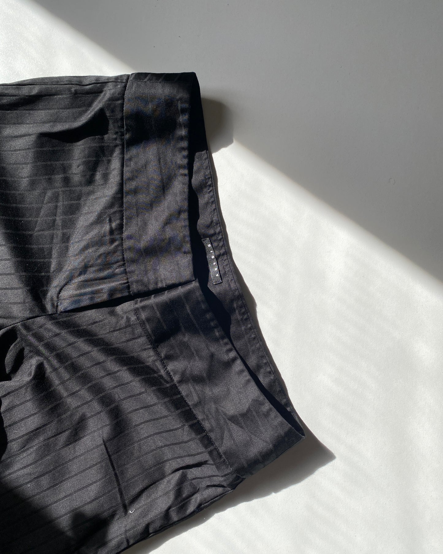 Black striped trousers