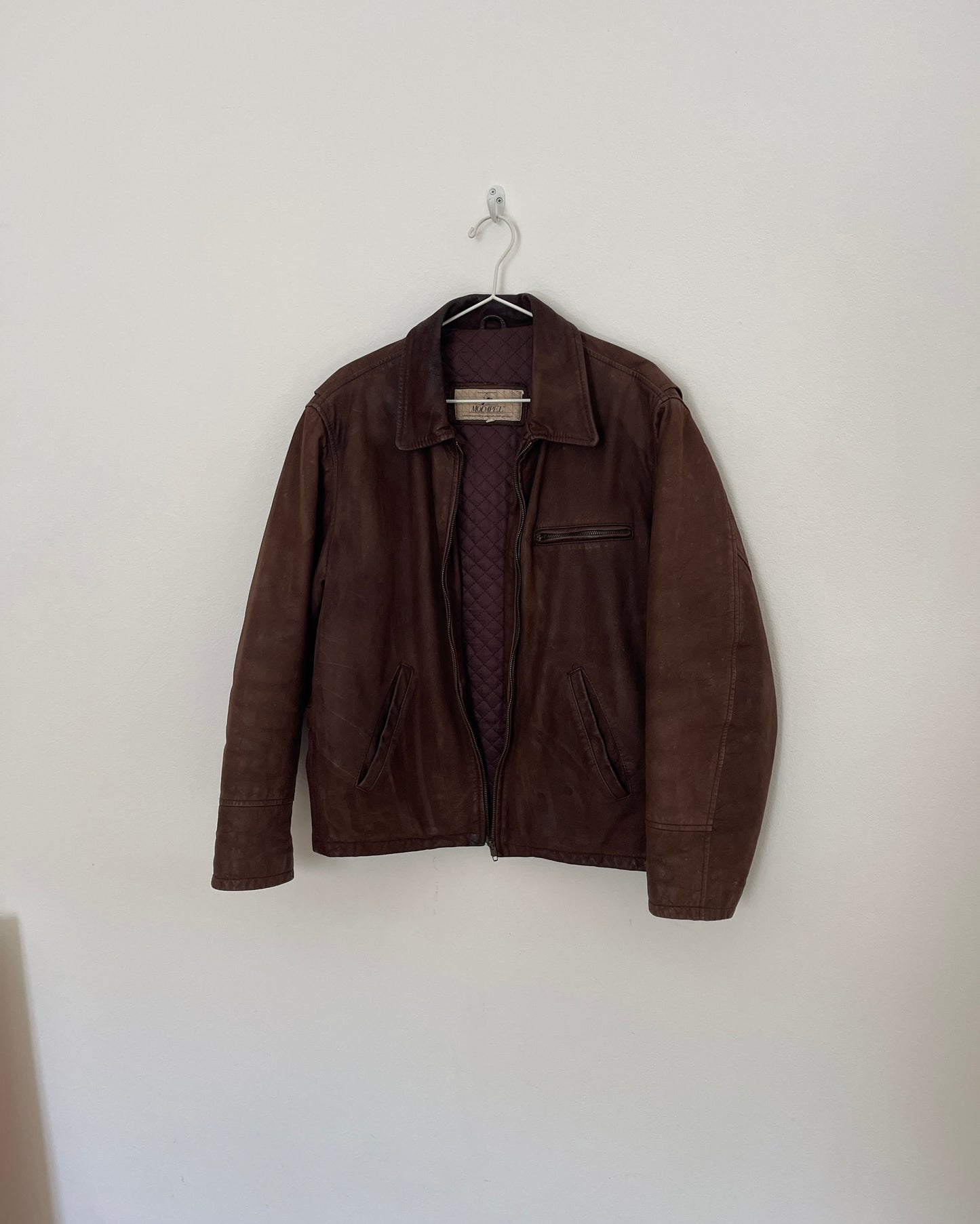 Brown leather bomber jacket