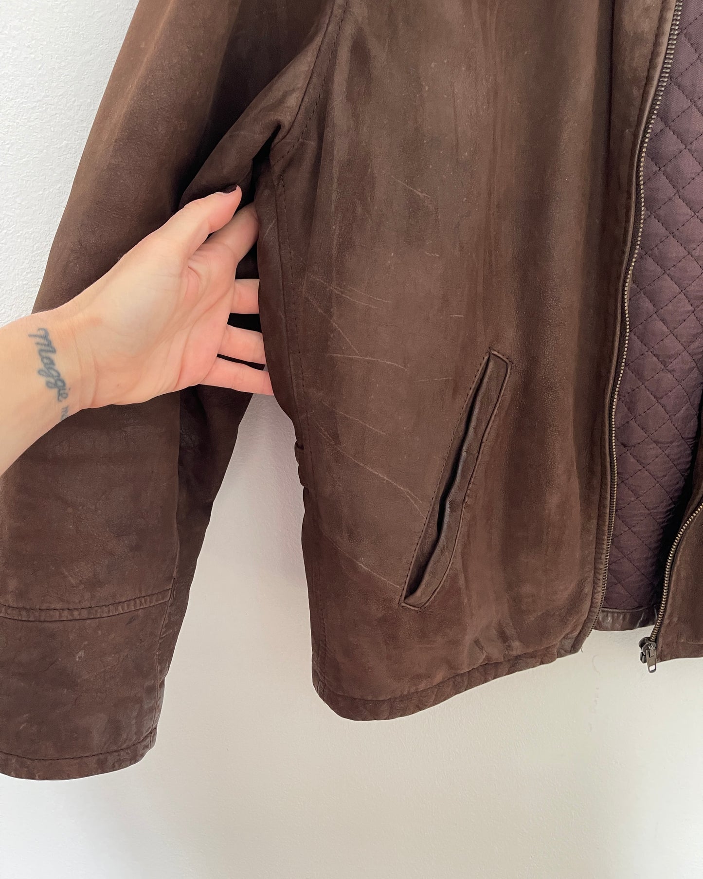 Brown leather bomber jacket