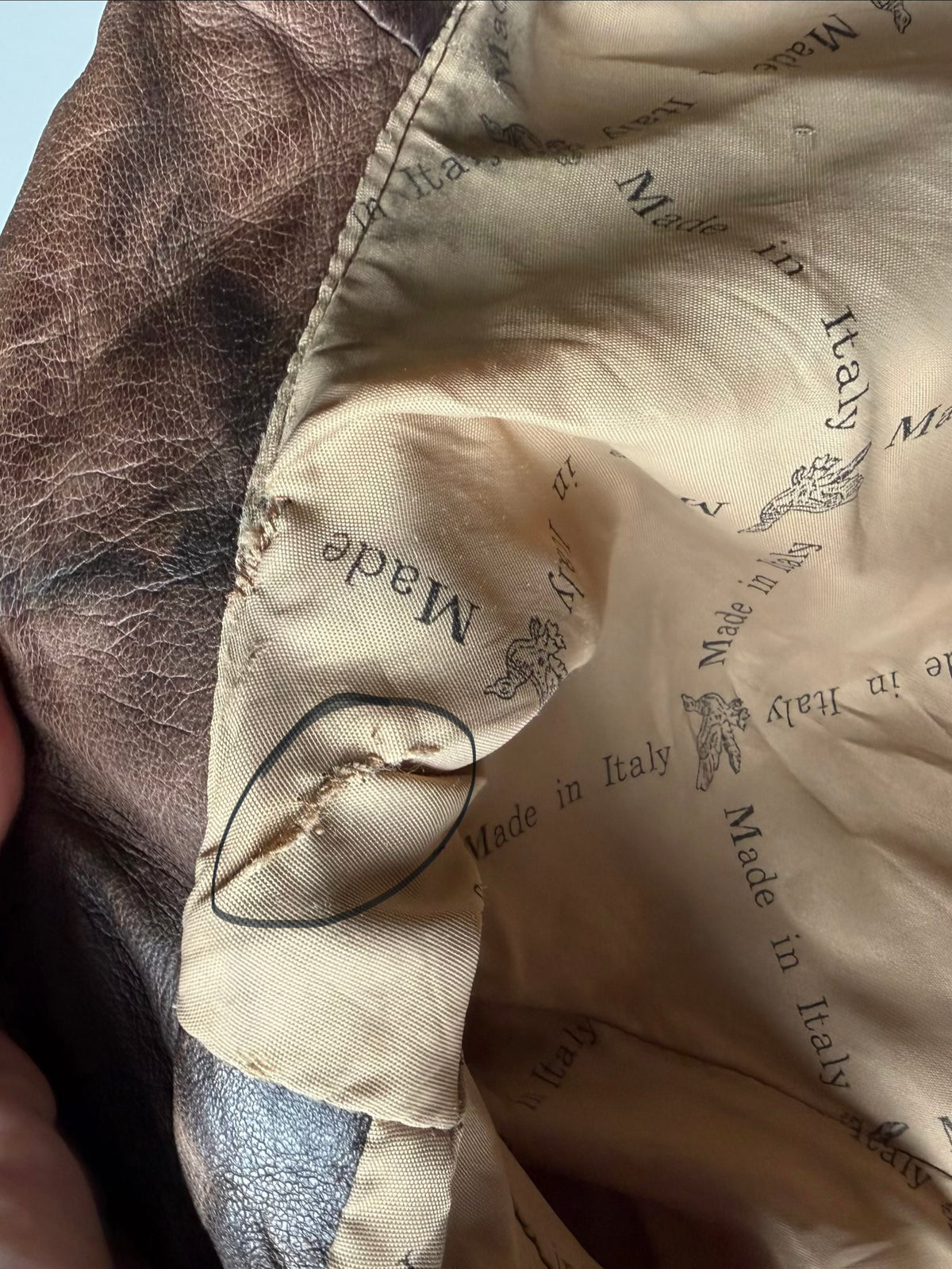 Distressed leather jacket