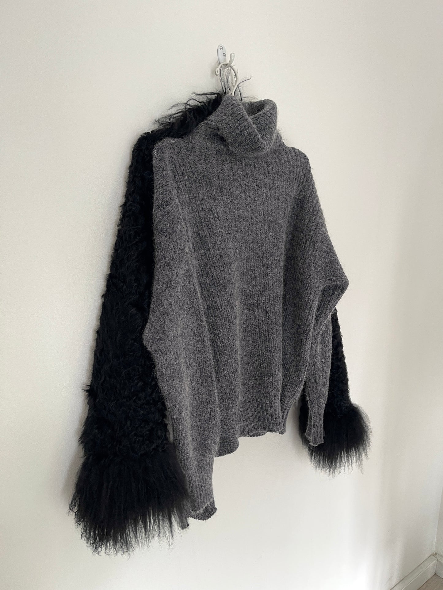 Asymmetric knit sweater