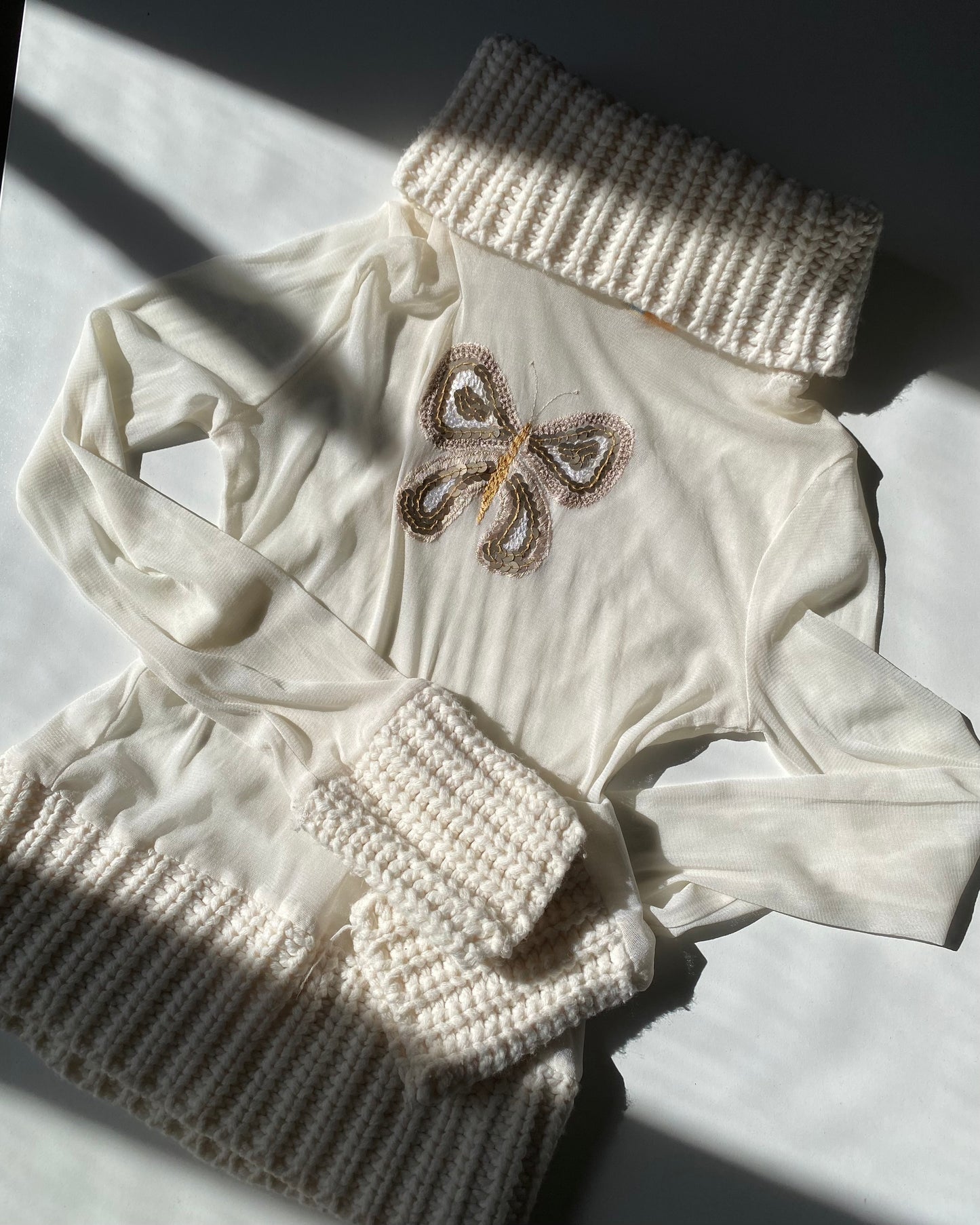 Sheer micro mesh turtleneck top