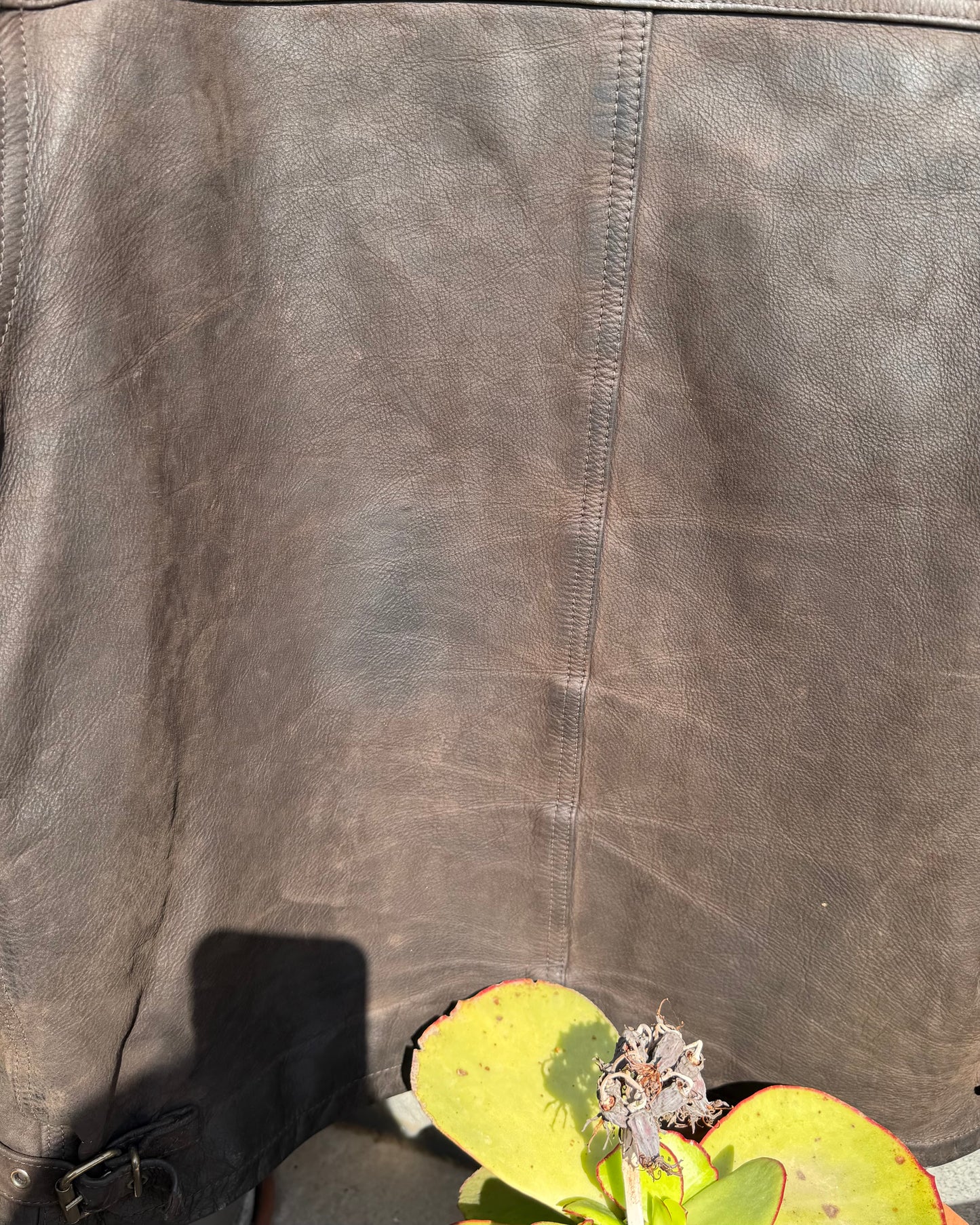 Brown distressed leather bomber jacket