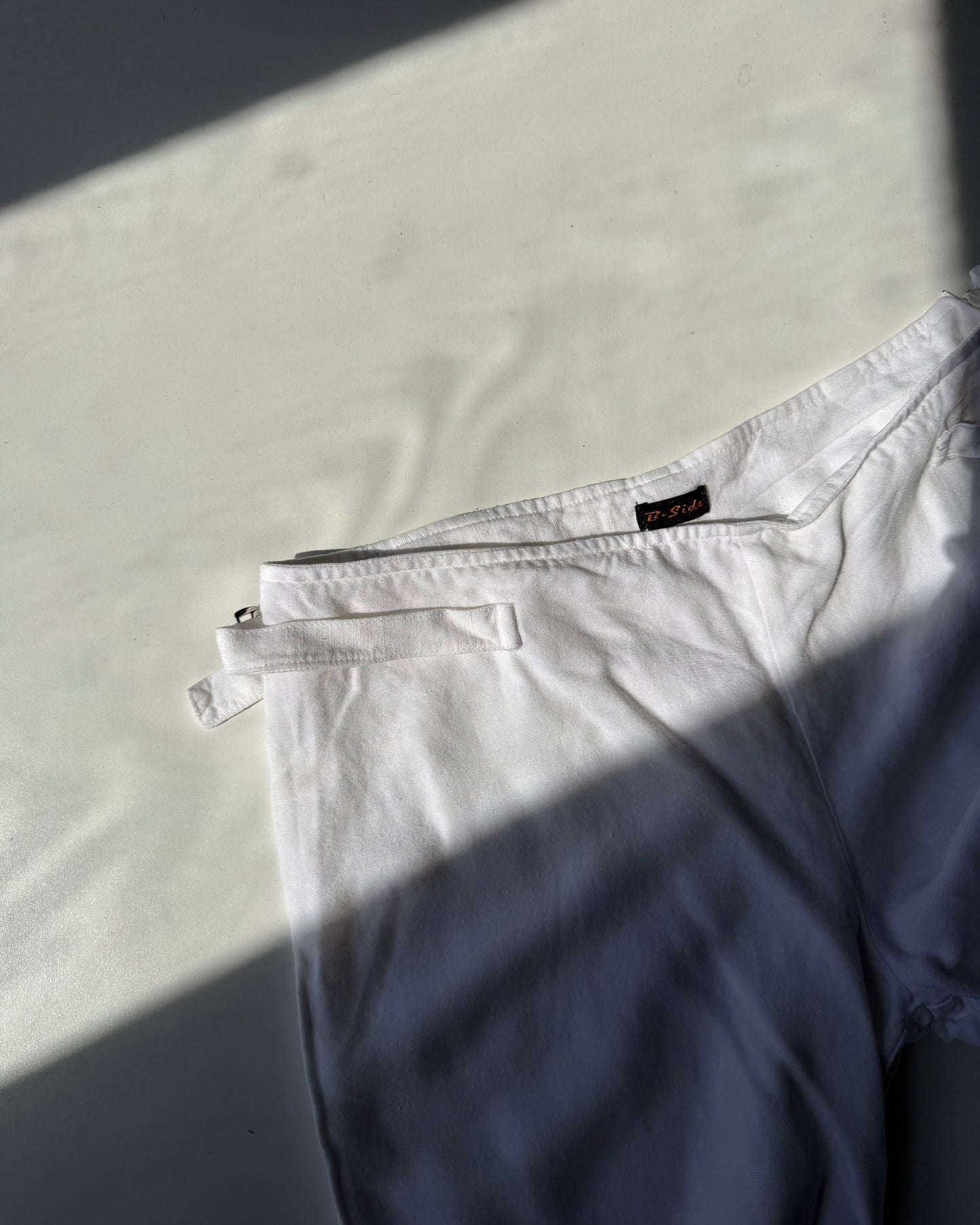 White linen cropped trousers