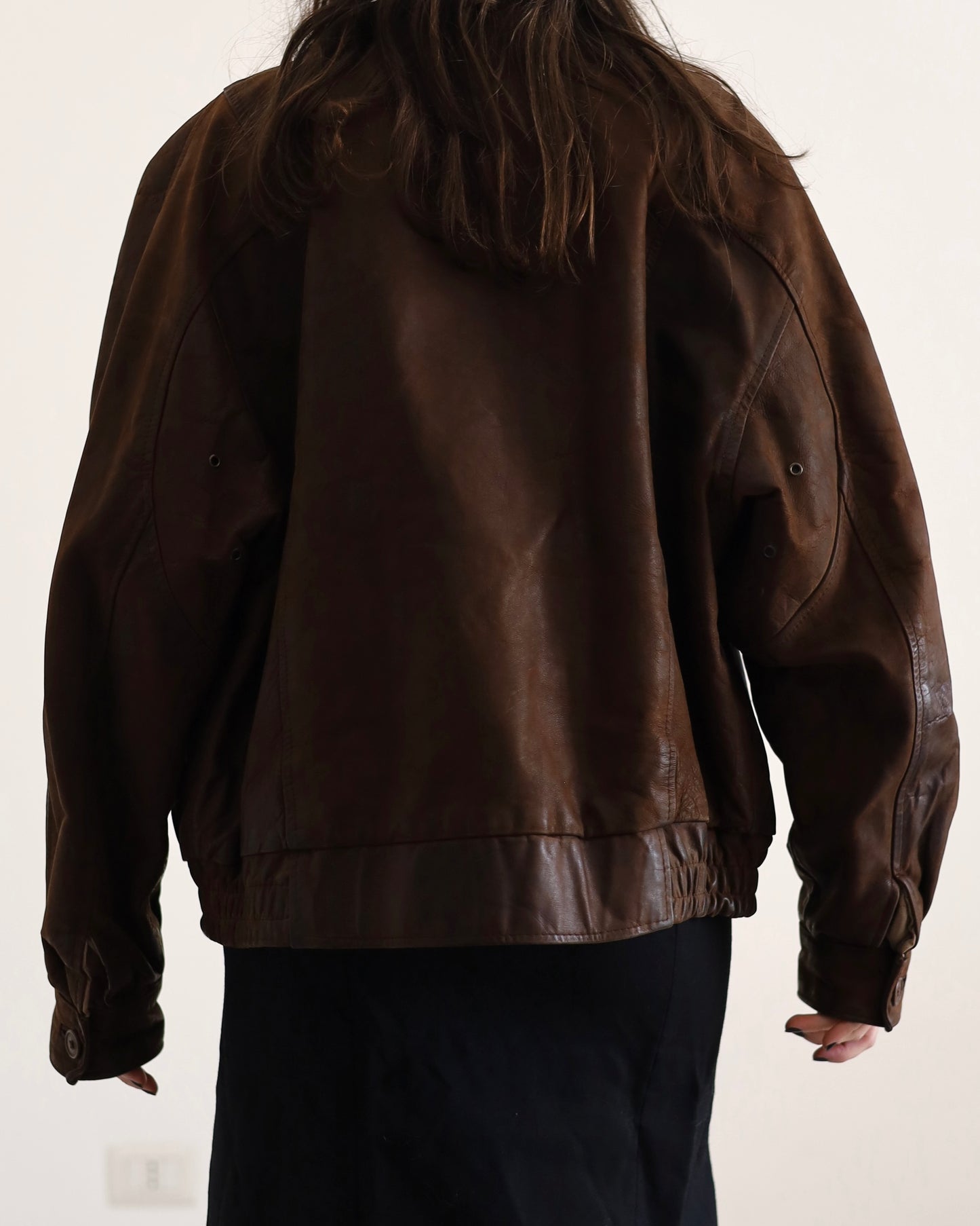 Distressed leather bomber jacket