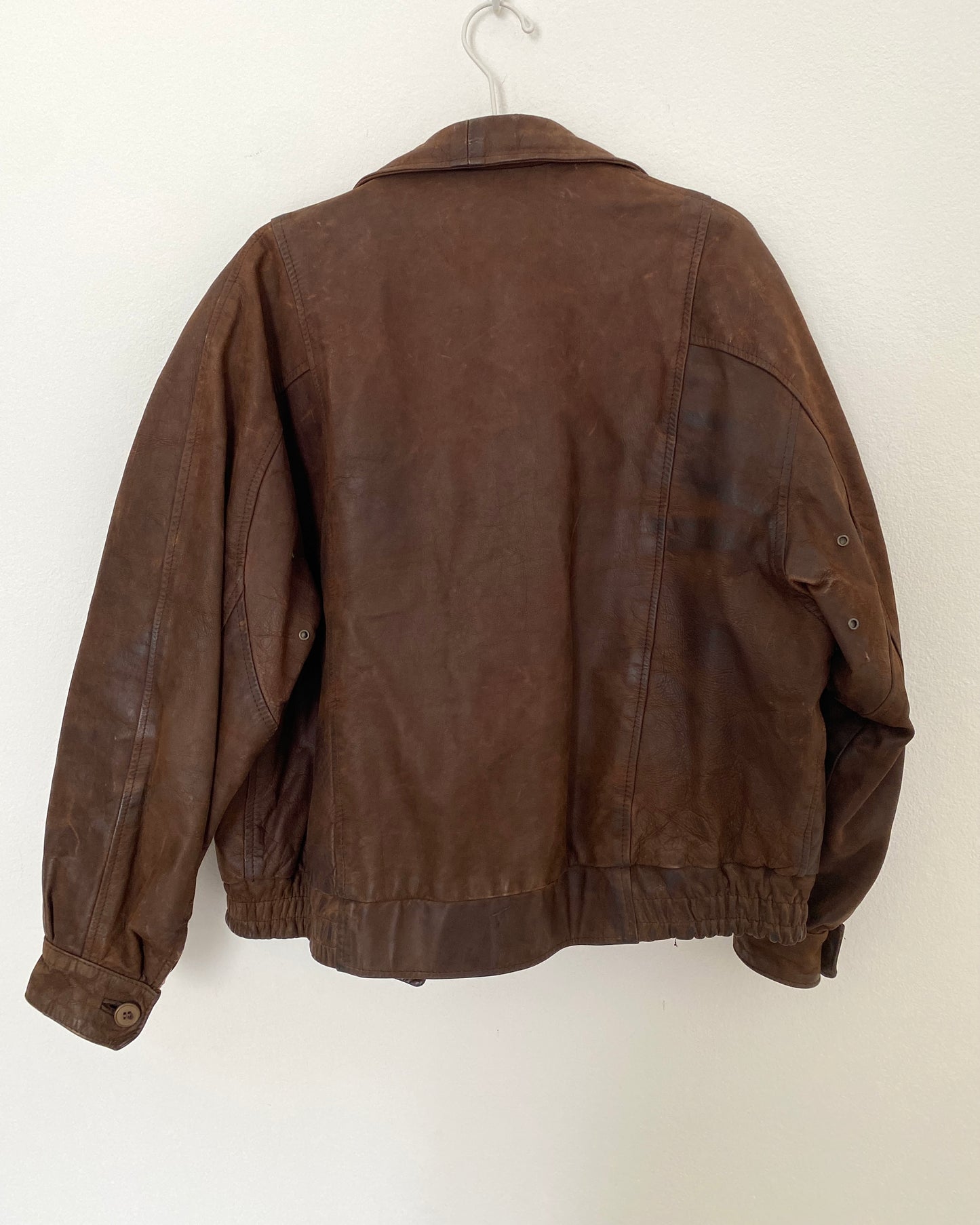 Distressed leather bomber jacket