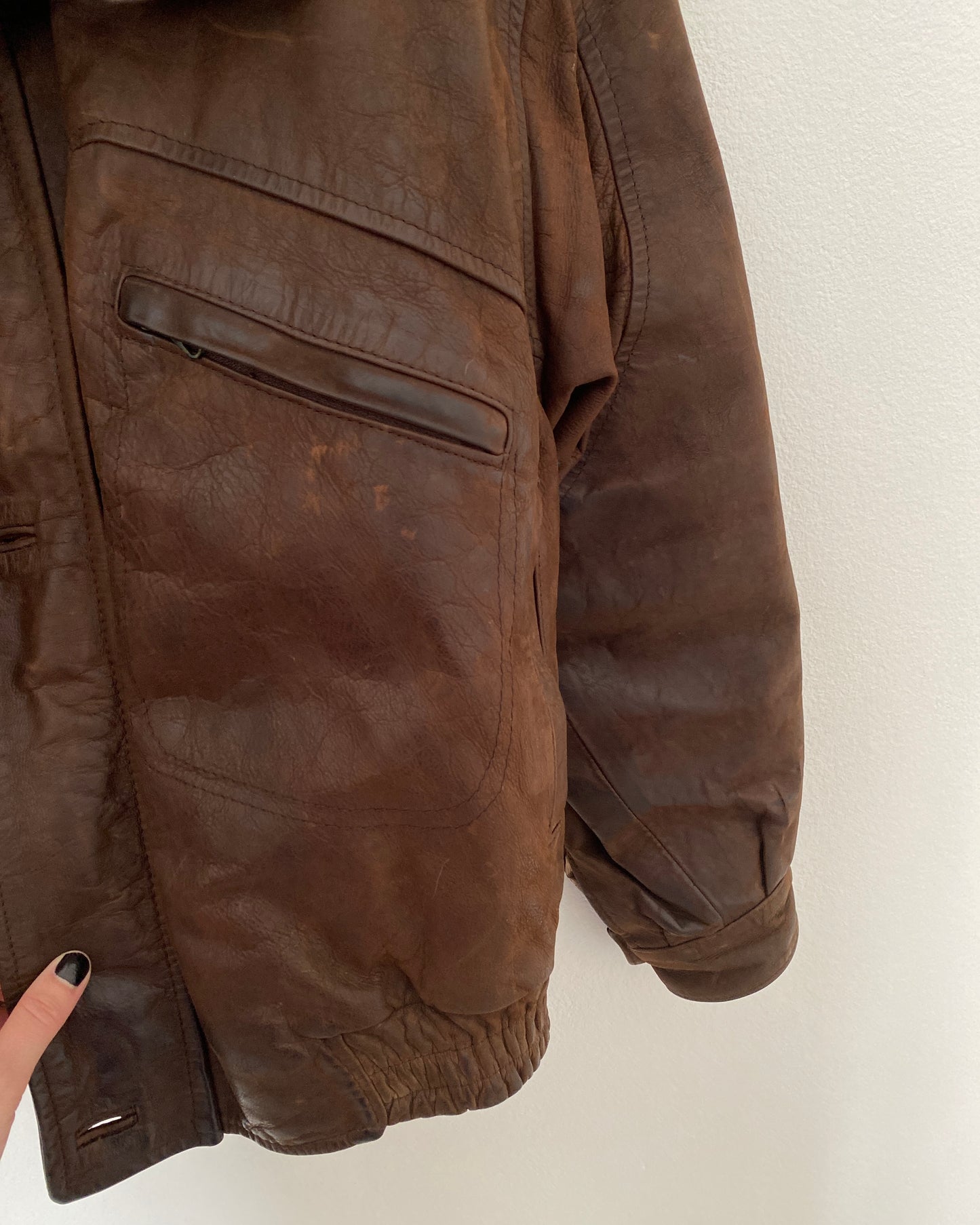 Distressed leather bomber jacket