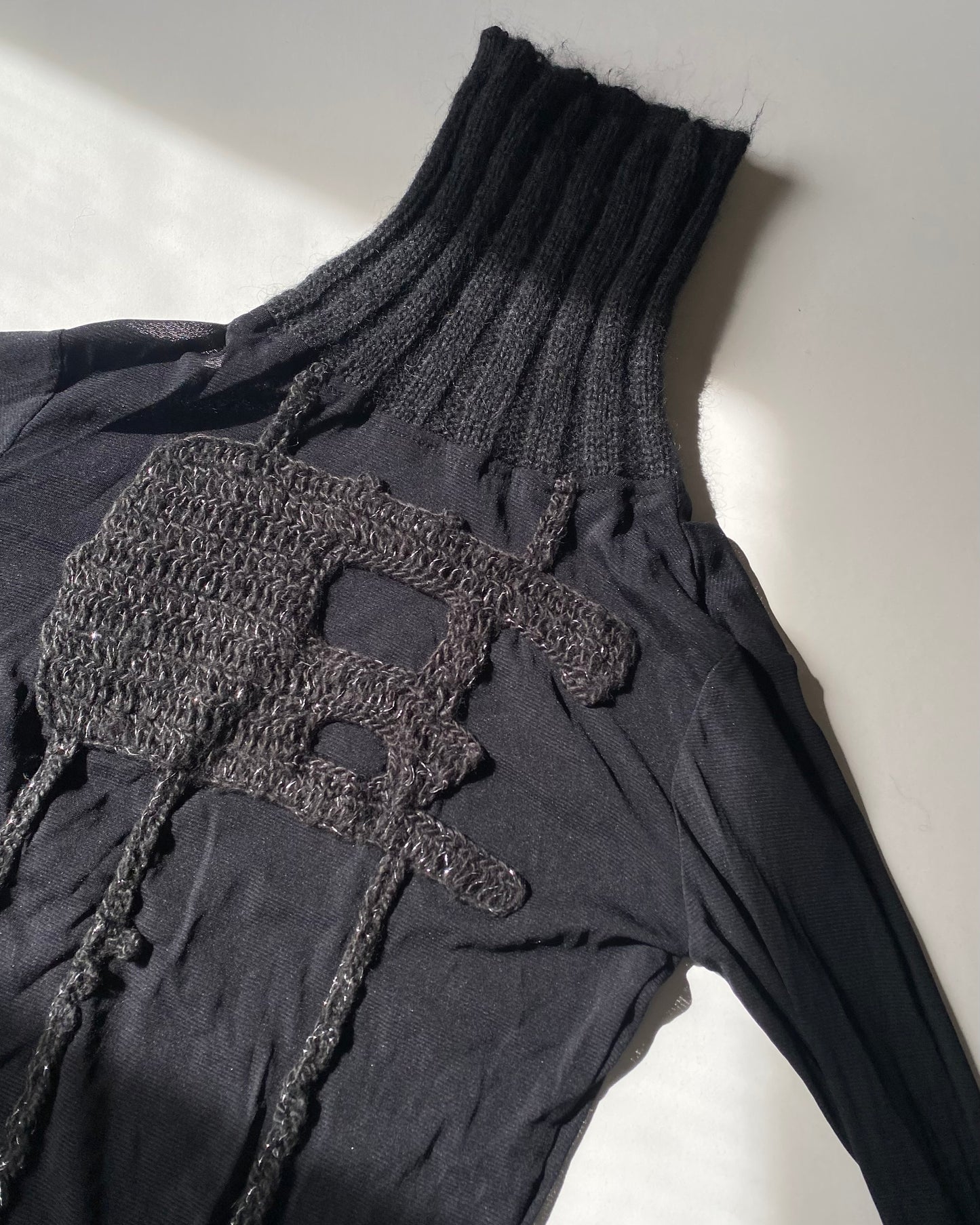 Sheer patchwork turleneck top