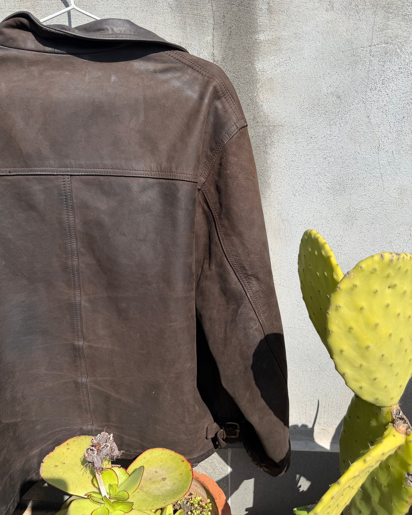 Brown distressed leather bomber jacket