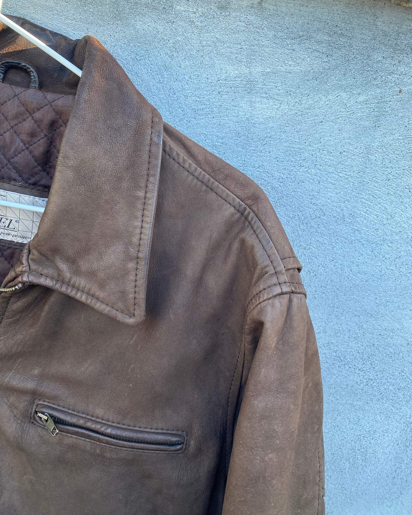 Brown leather bomber jacket