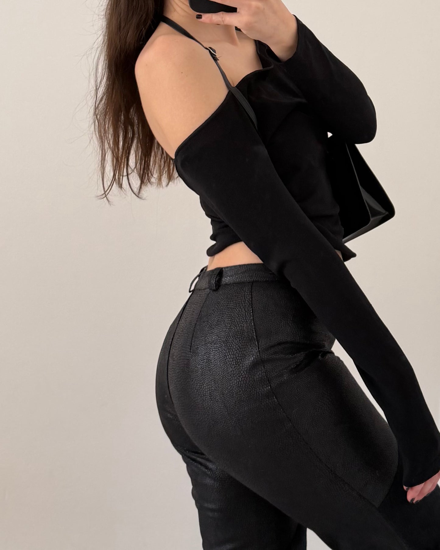 Black faux leather trousers
