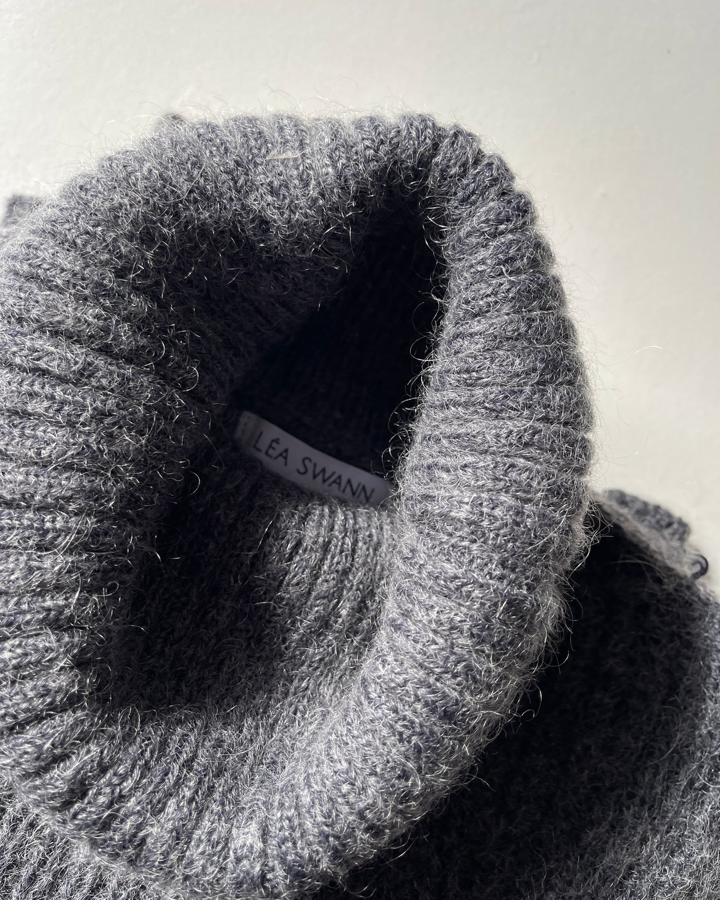 Asymmetric knit sweater