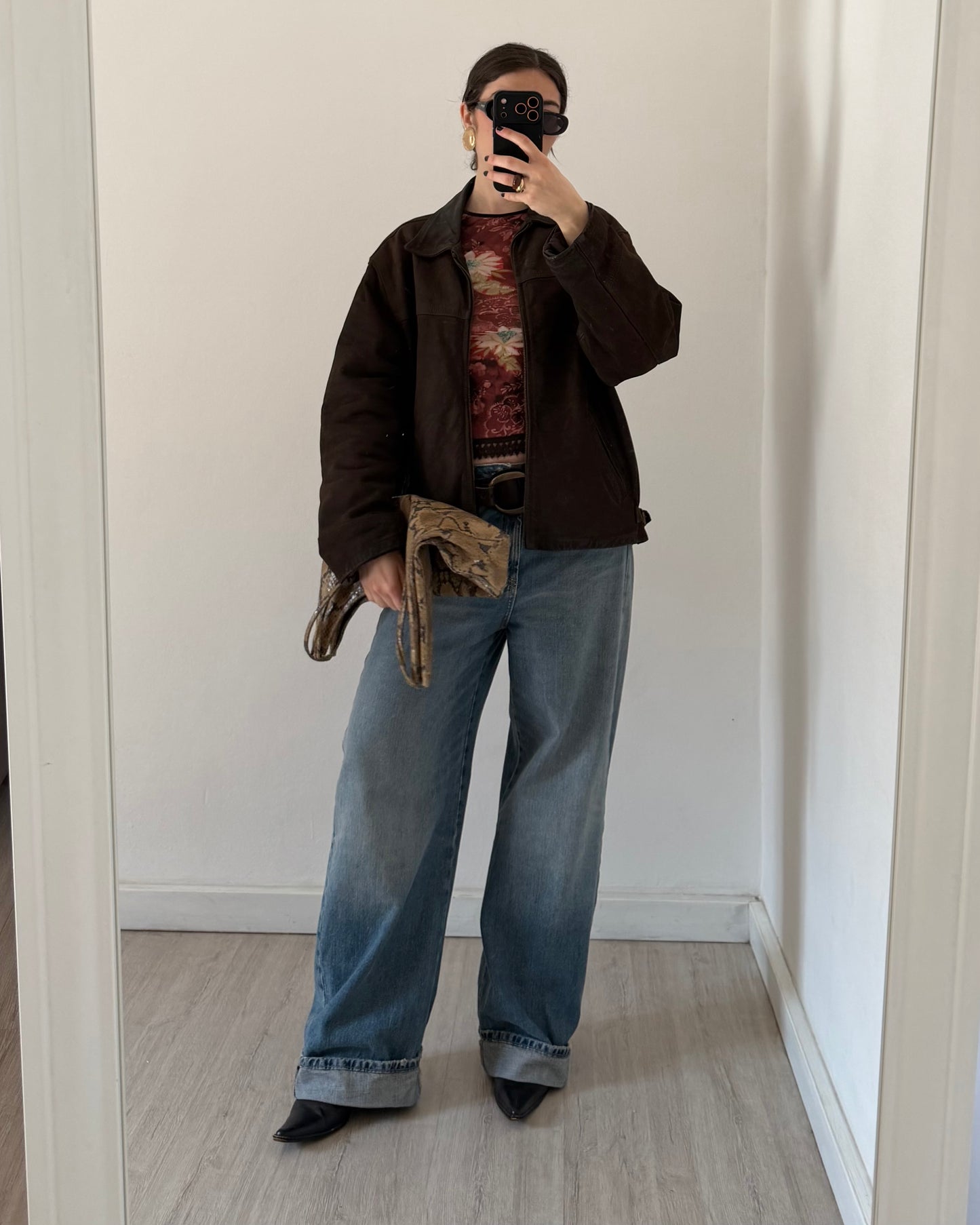 Brown distressed leather bomber jacket