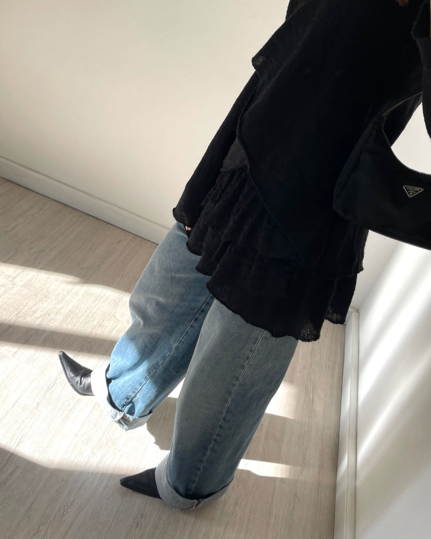 Long knit top with lace volants