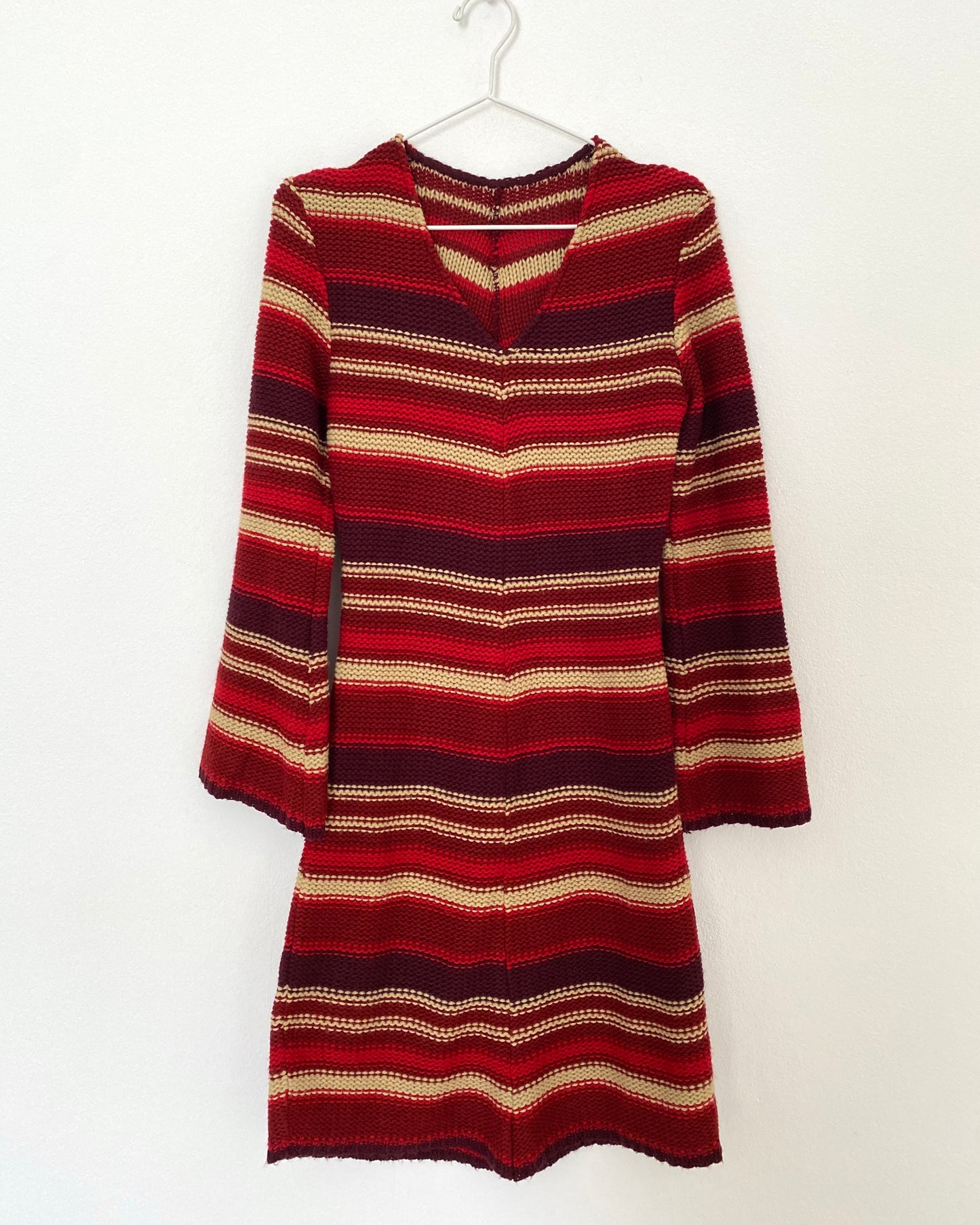 Knitted striped dress with asymmetric hem