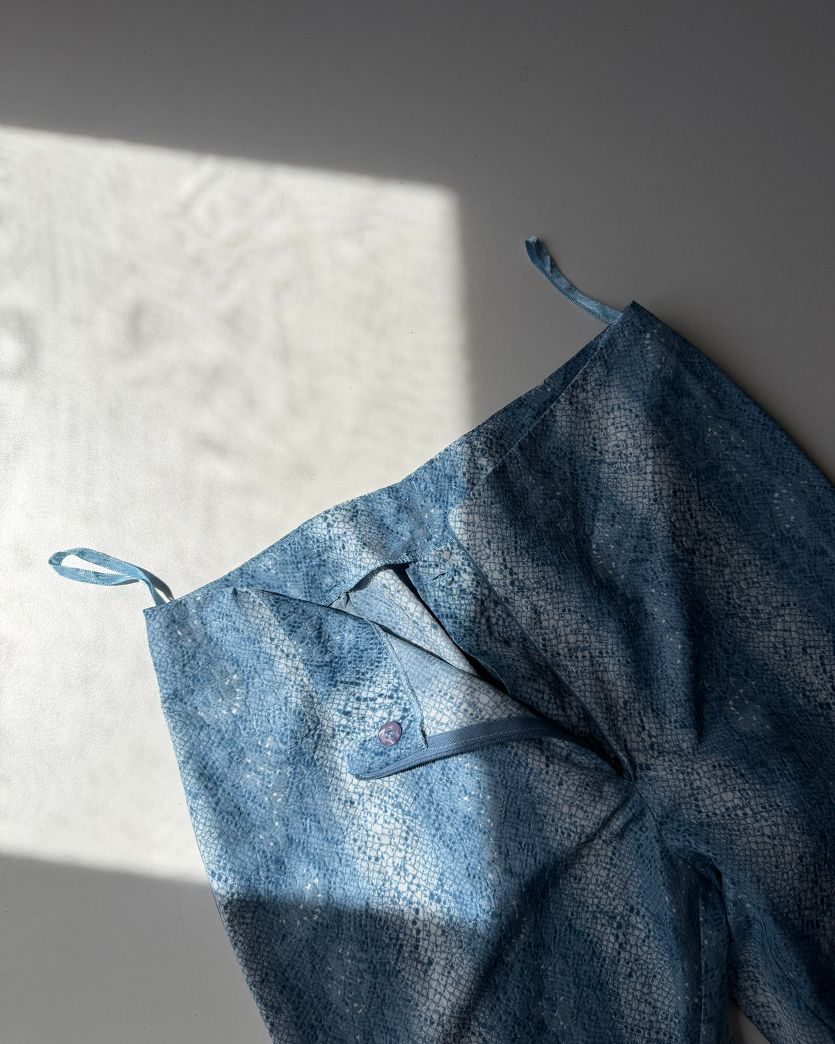 Y2k blue snakeskin flares