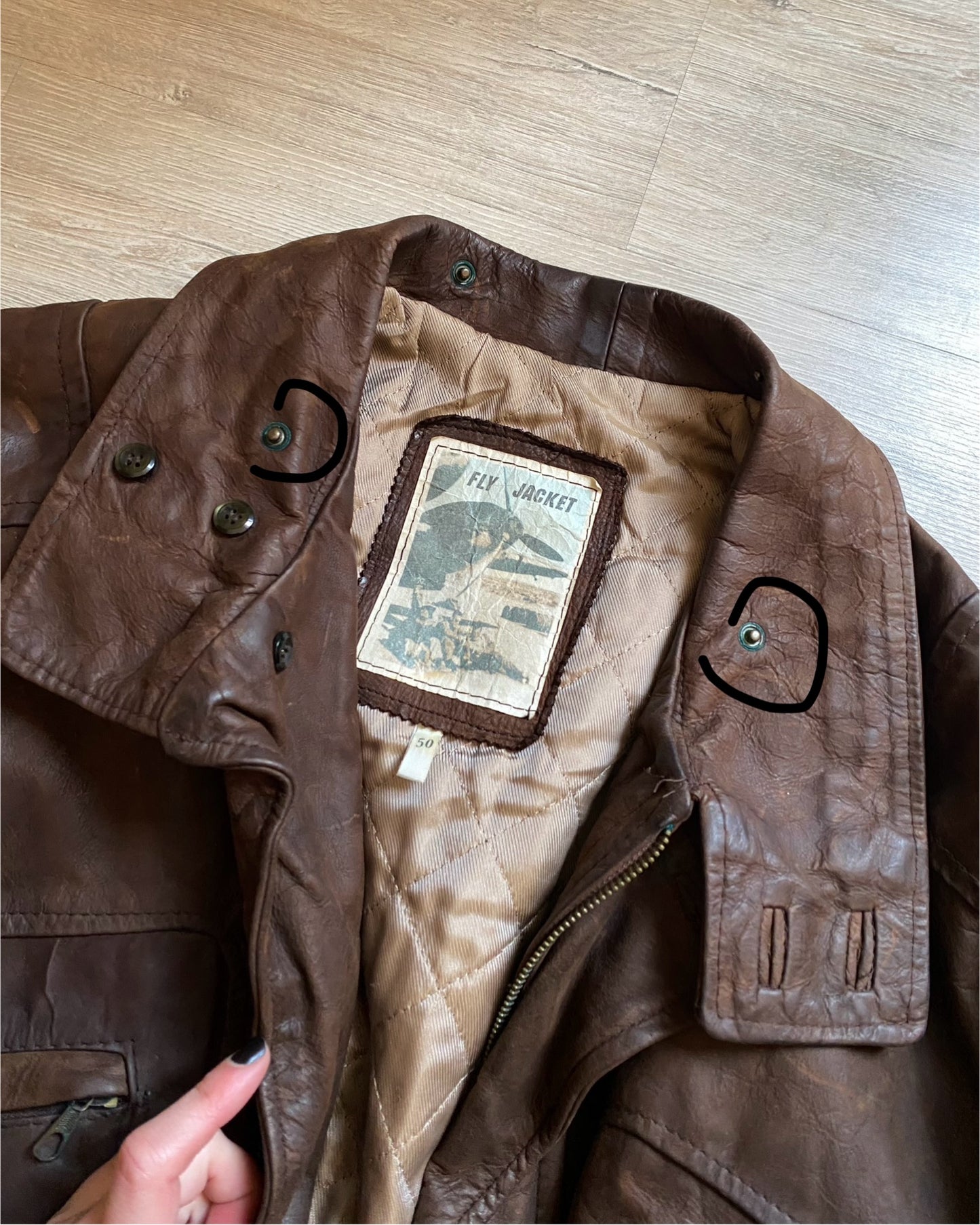 Distressed leather bomber jacket