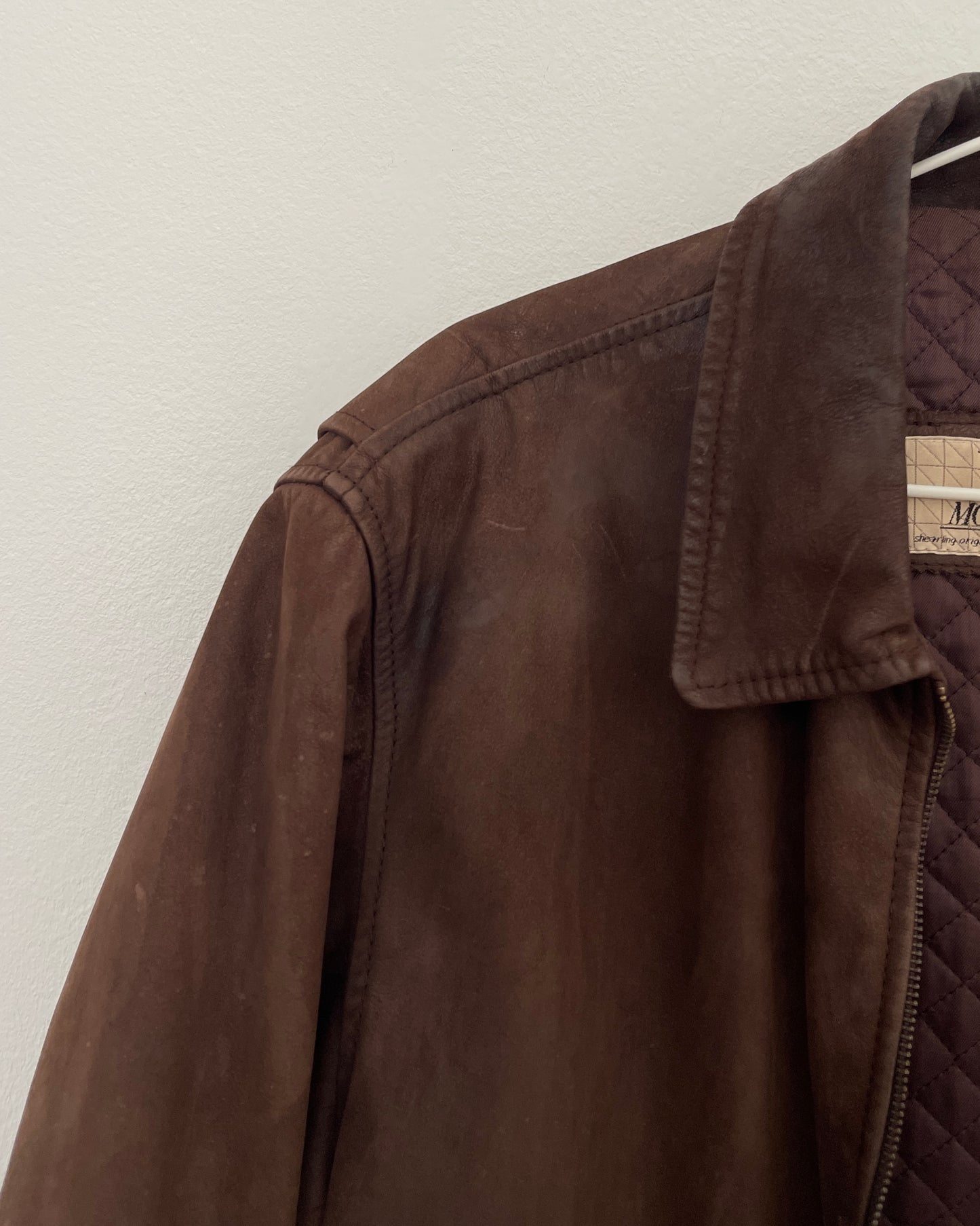 Brown leather bomber jacket