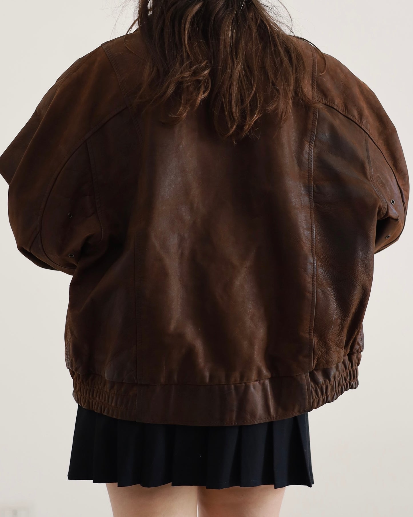 Distressed leather bomber jacket