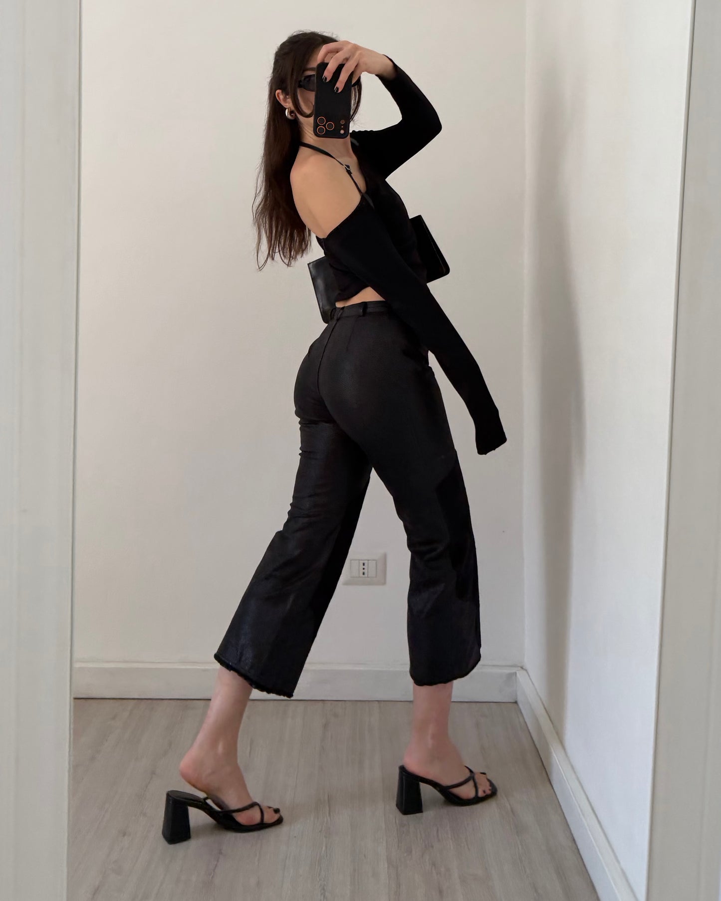 Black faux leather trousers