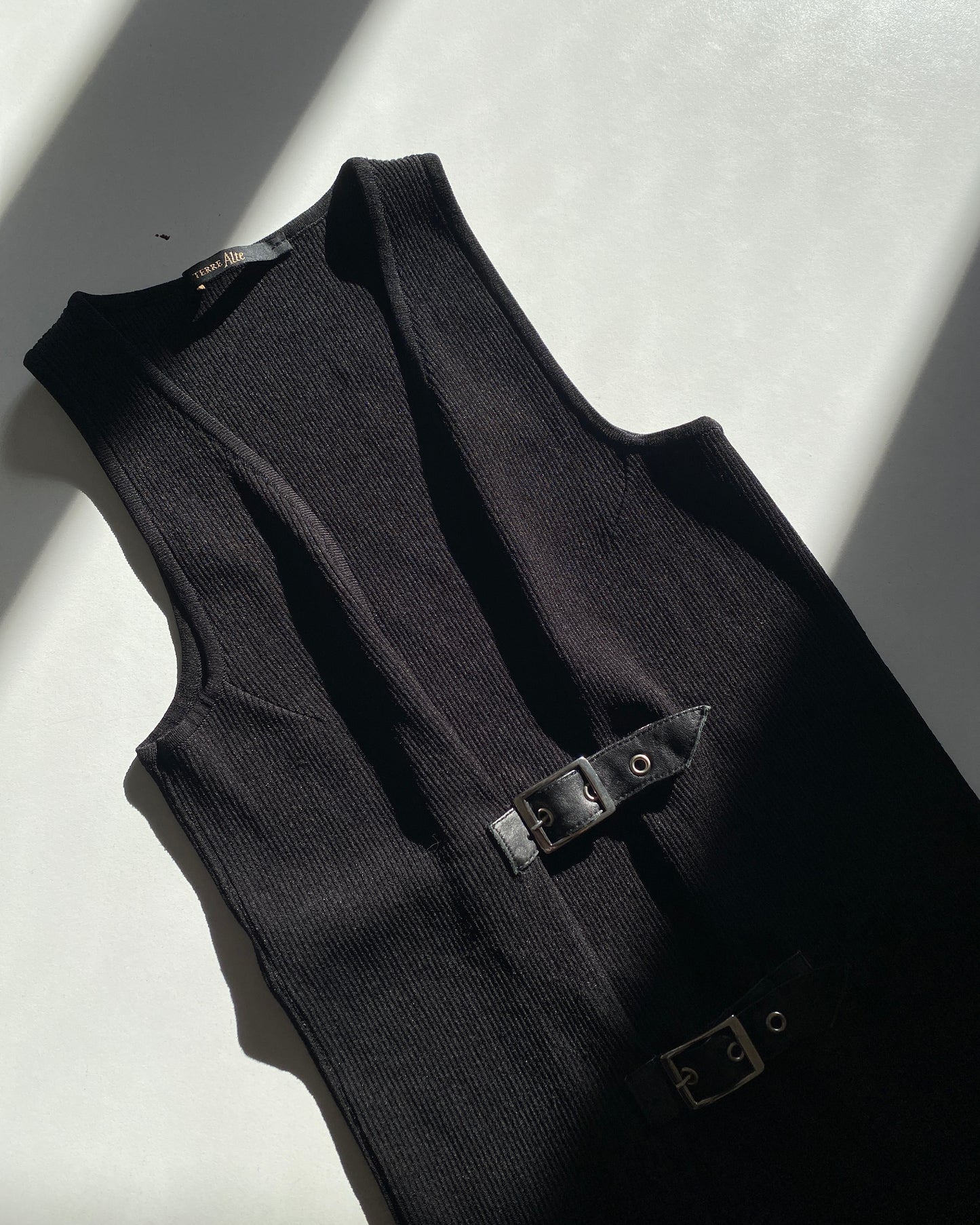 Waistcoat top with metal buckles