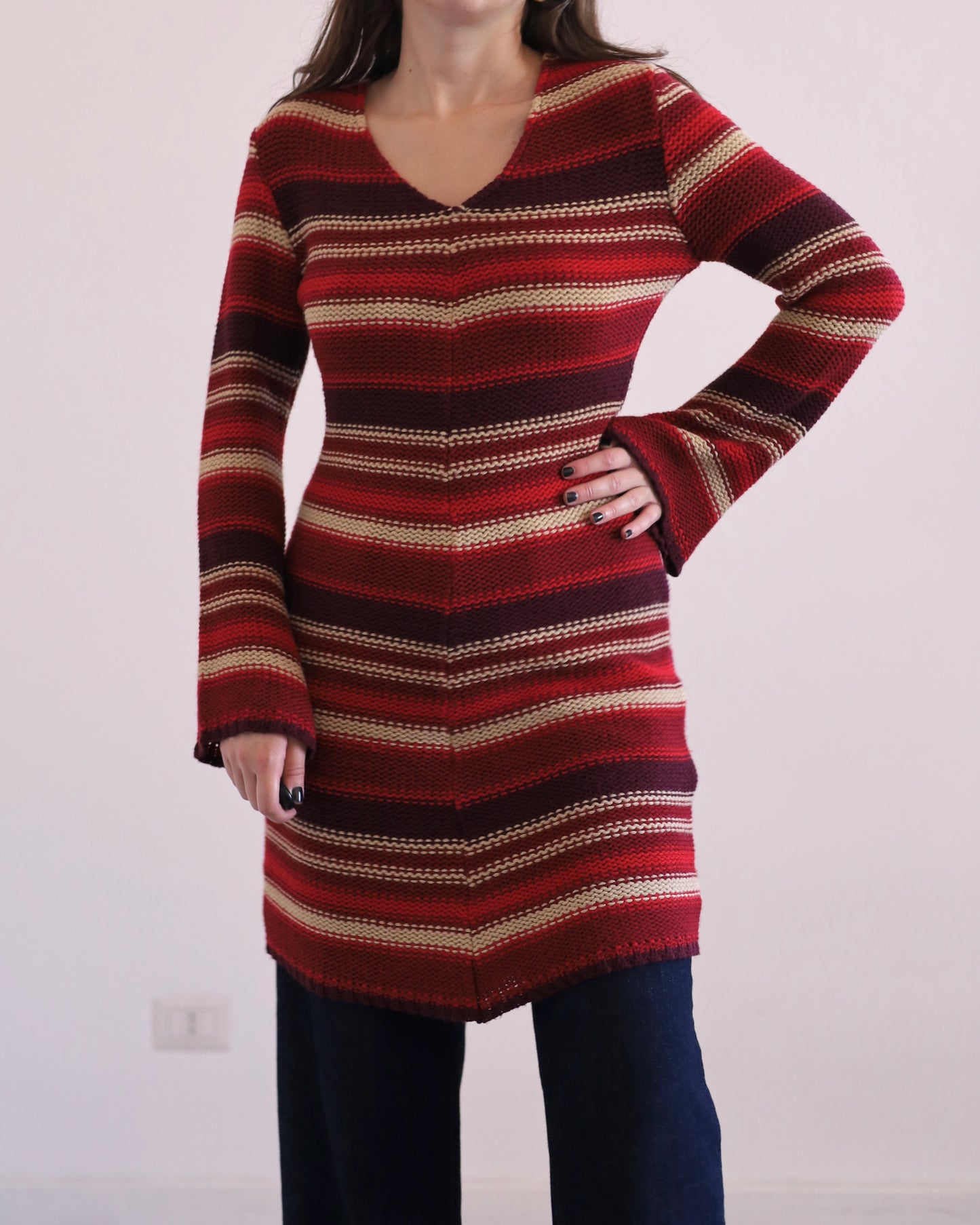 Knitted striped dress with asymmetric hem