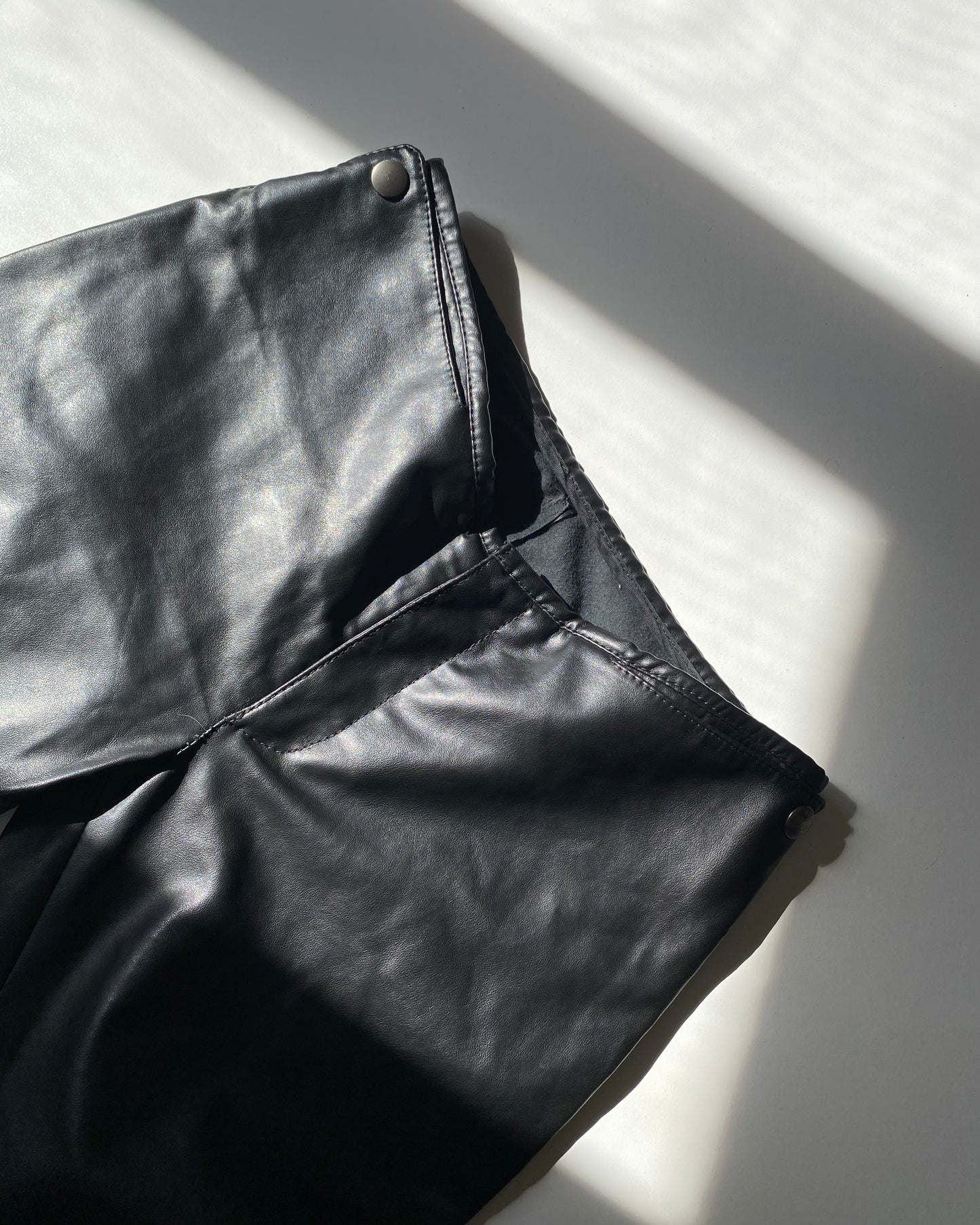 Faux leather trousers