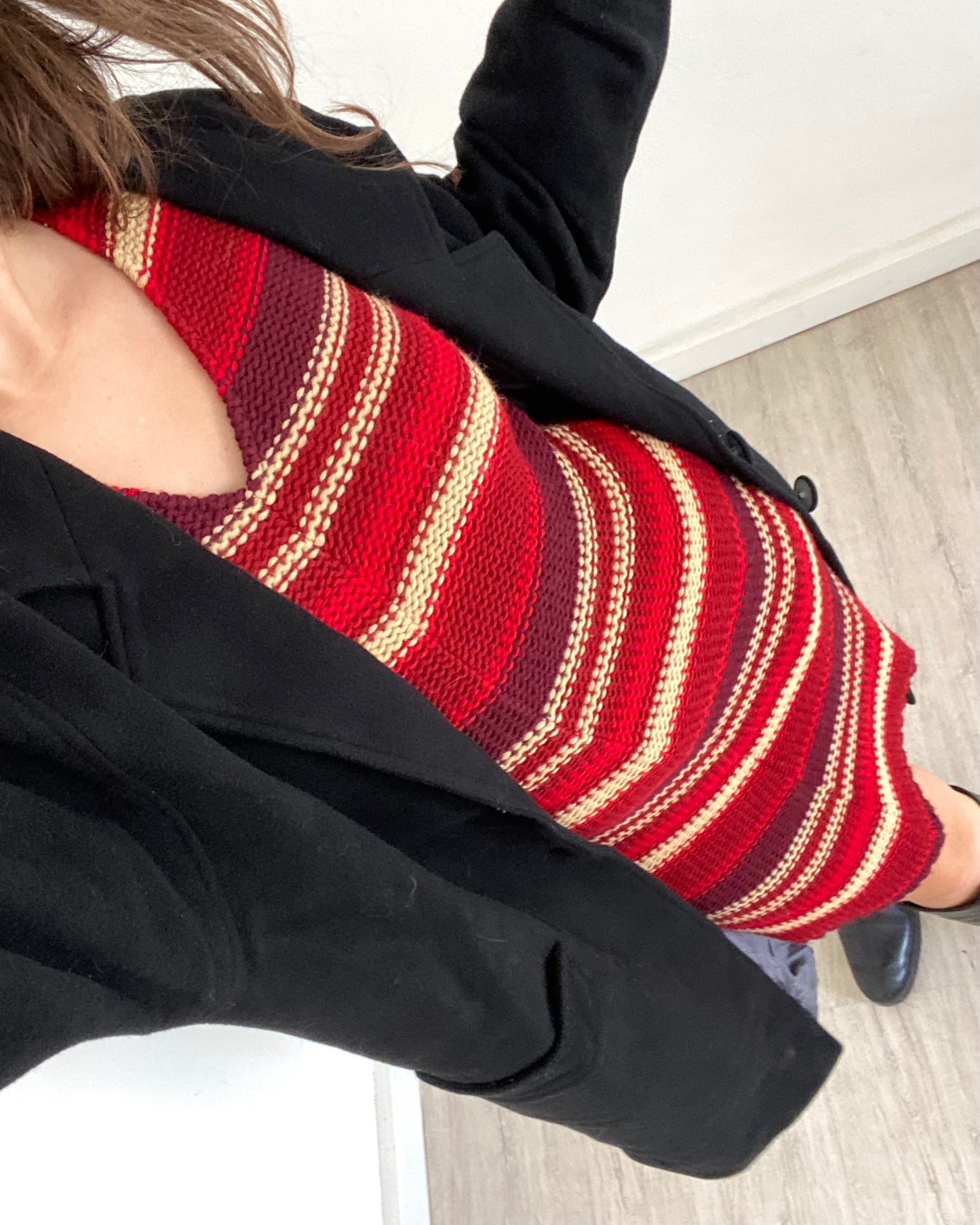 Knitted striped dress with asymmetric hem