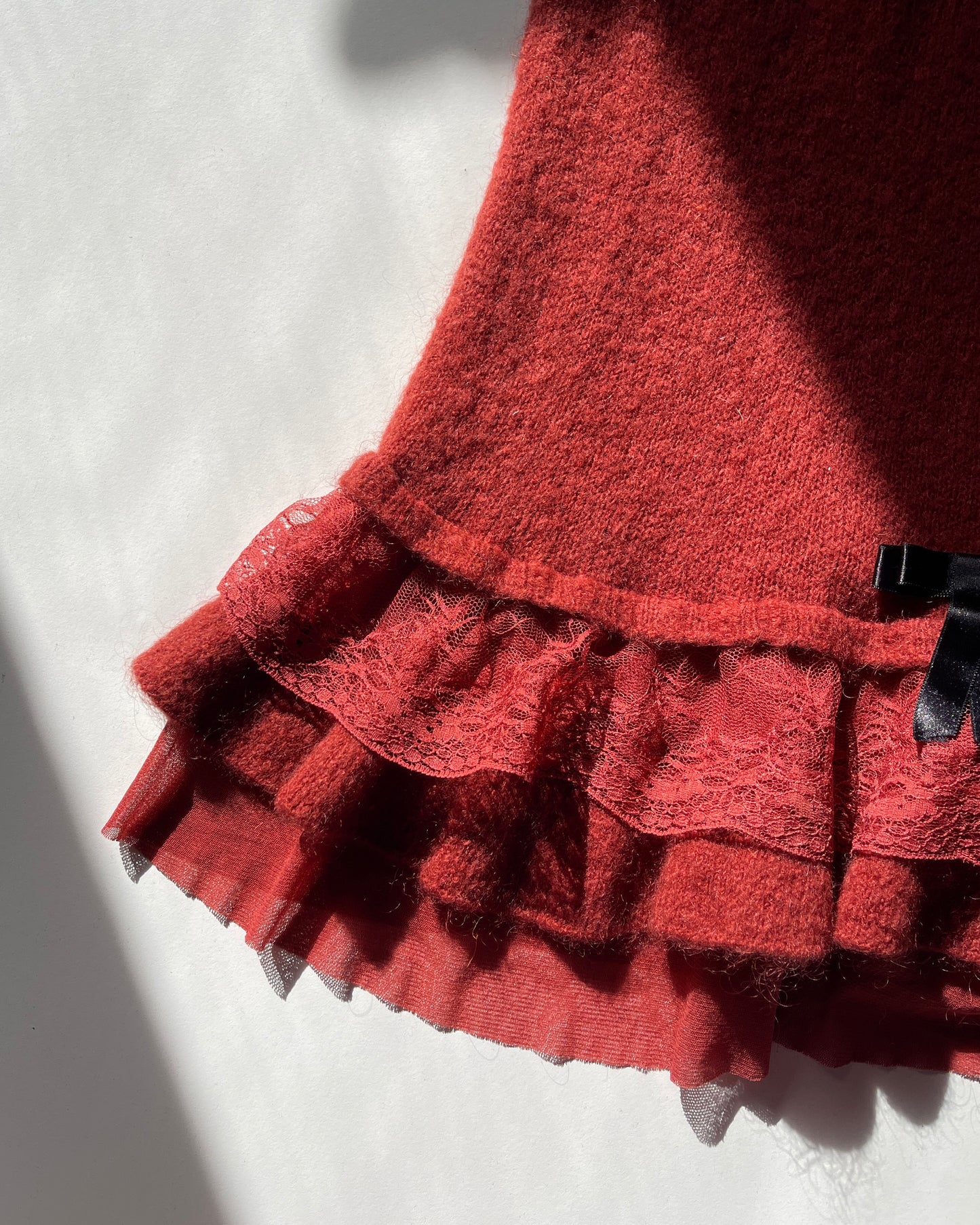 Knit dress with lace volants