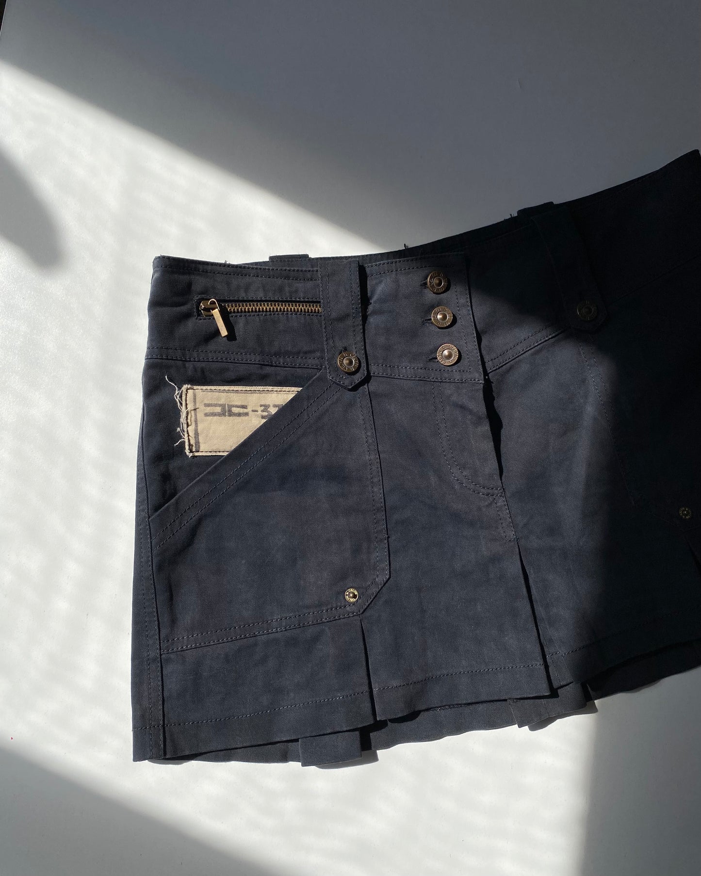 Pleated mini skirt by Celyn b