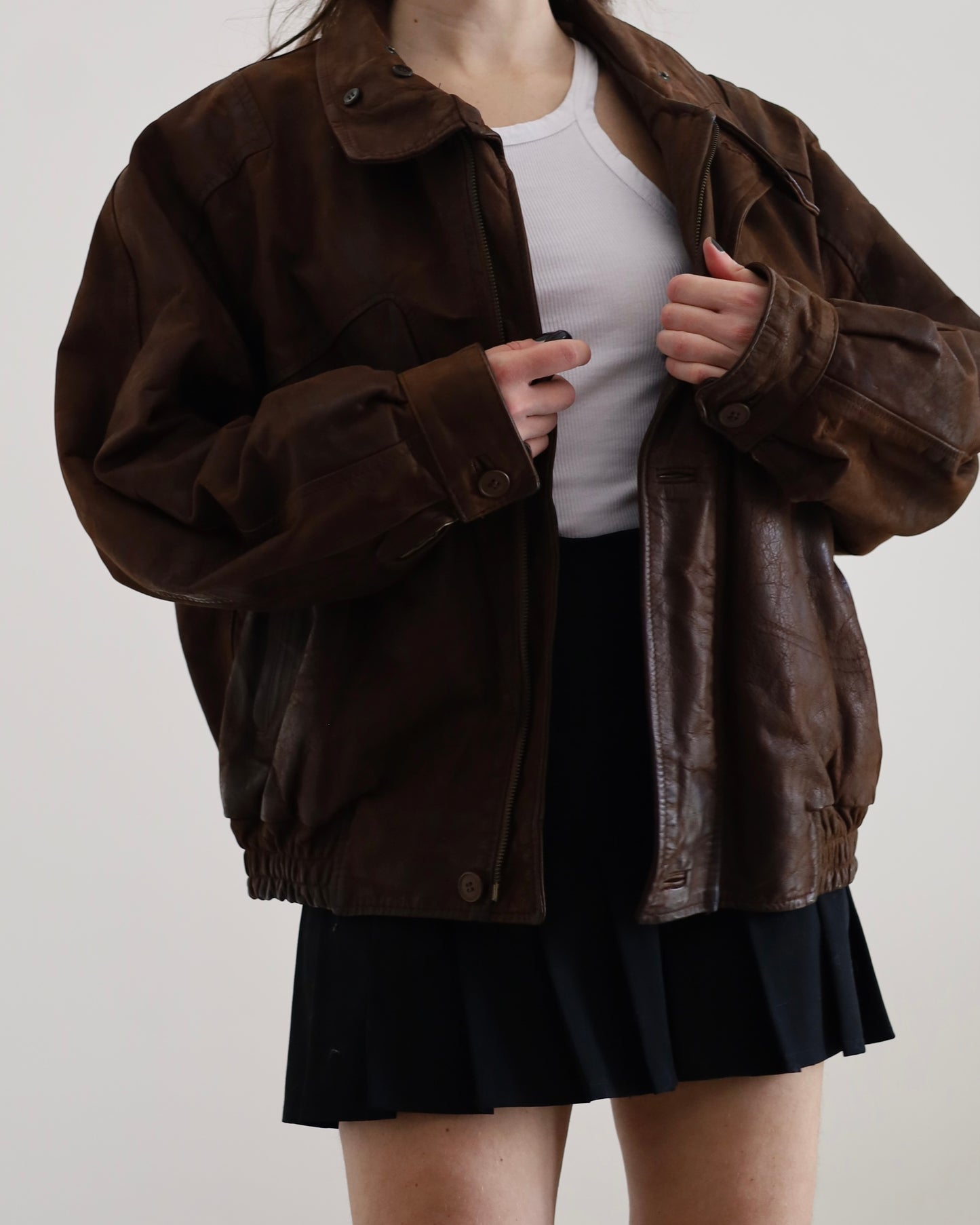 Distressed leather bomber jacket