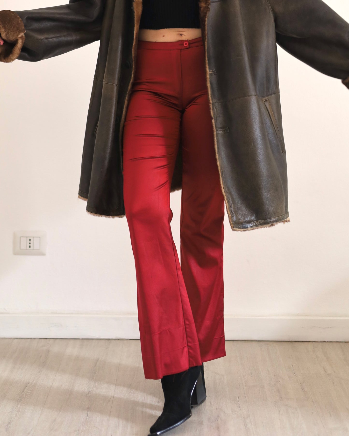 Red satin flare trousers