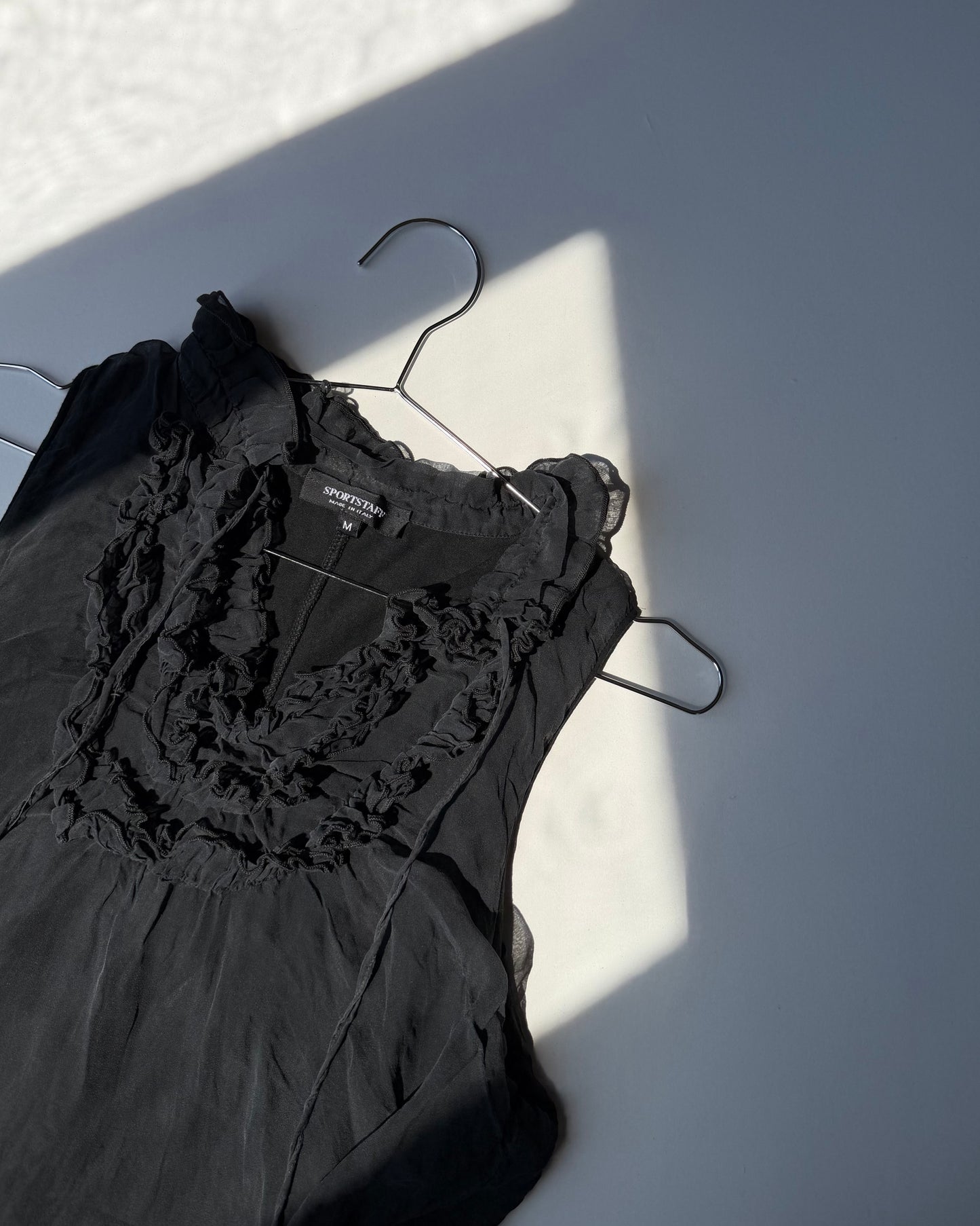 Sportstaff ruffle top
