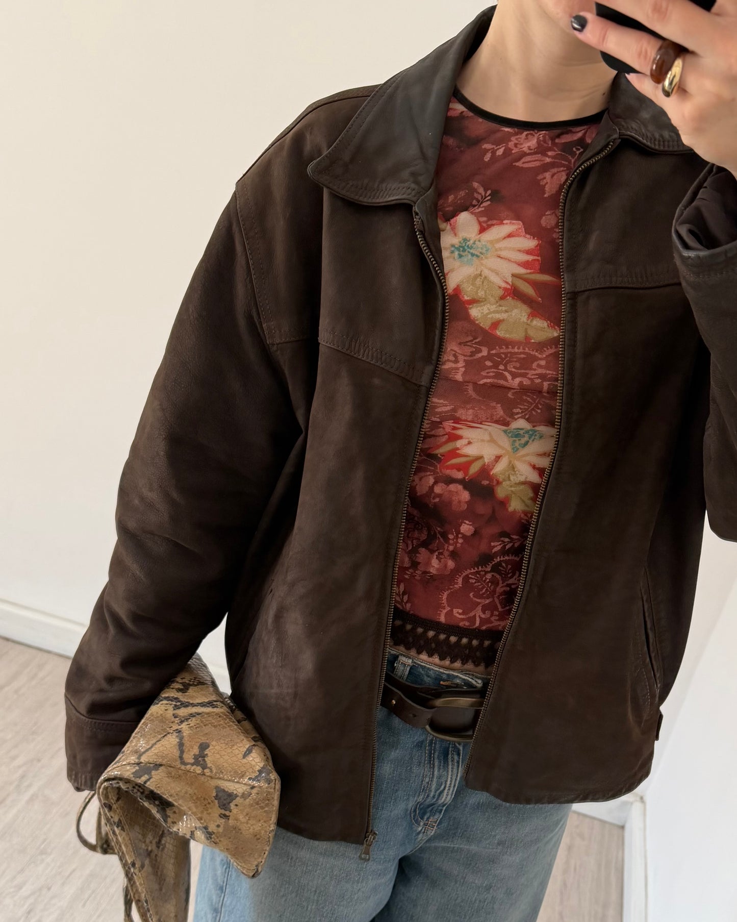 Brown distressed leather bomber jacket
