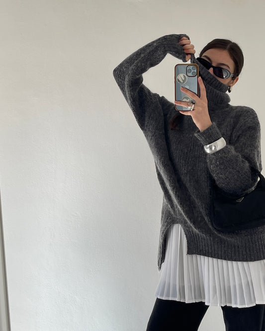 Asymmetric knit sweater