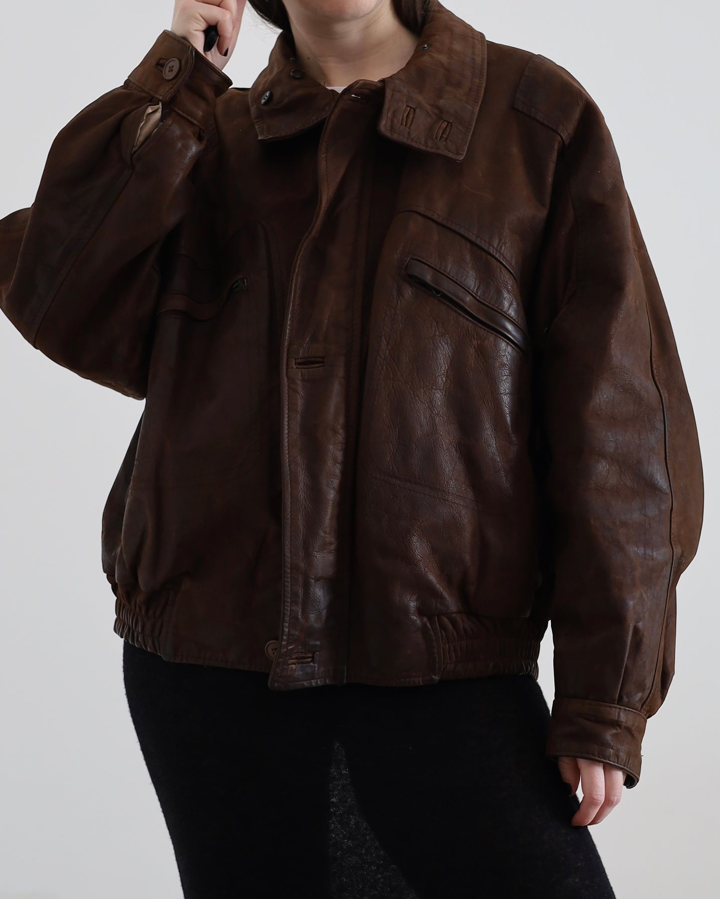 Distressed leather bomber jacket