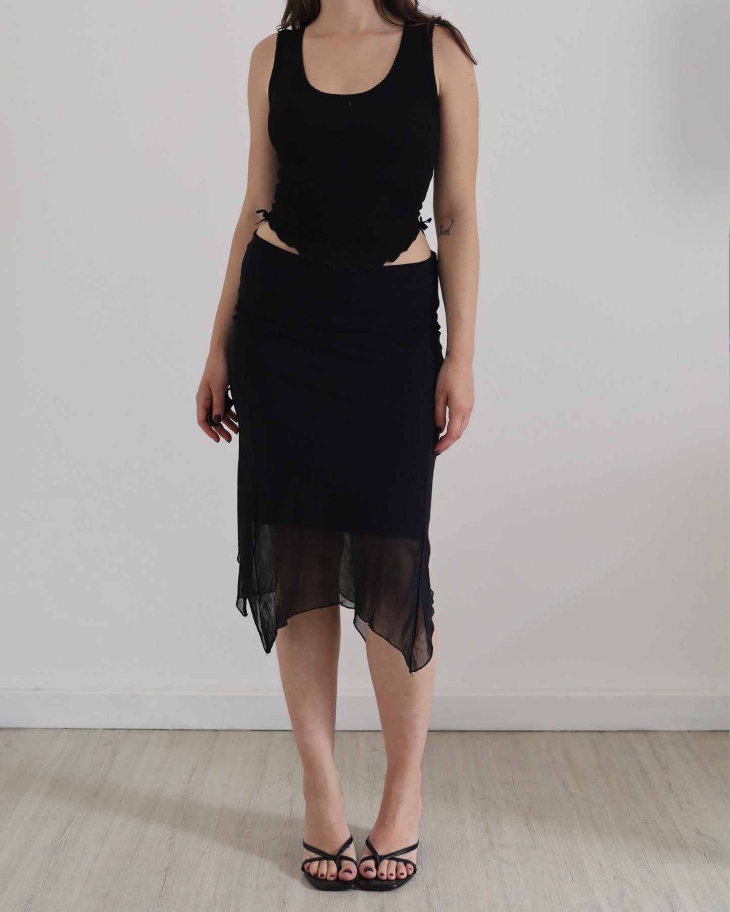 Asymmetric micro mesh skirt