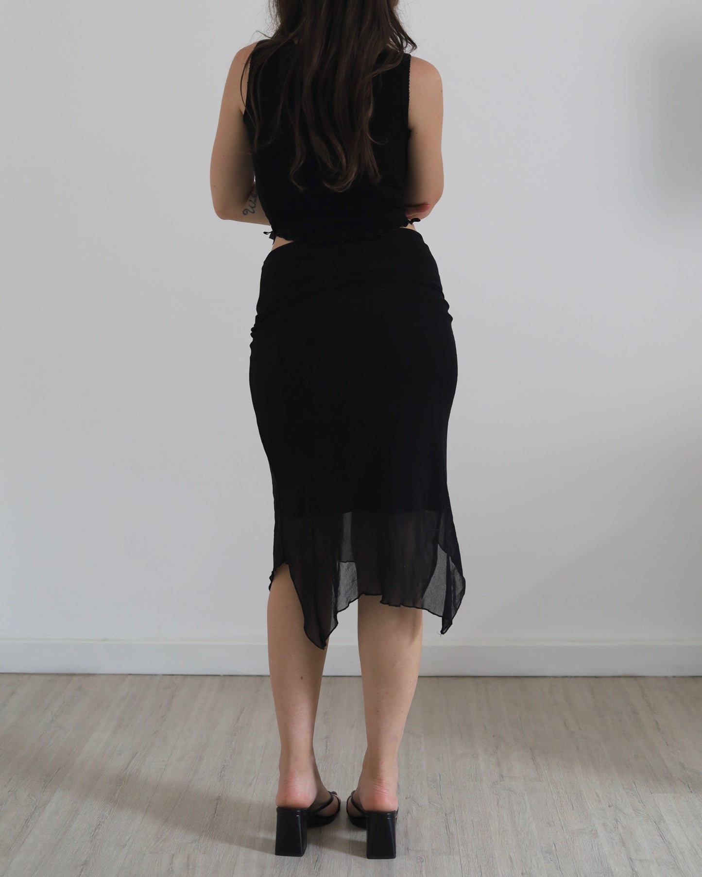 Asymmetric micro mesh skirt