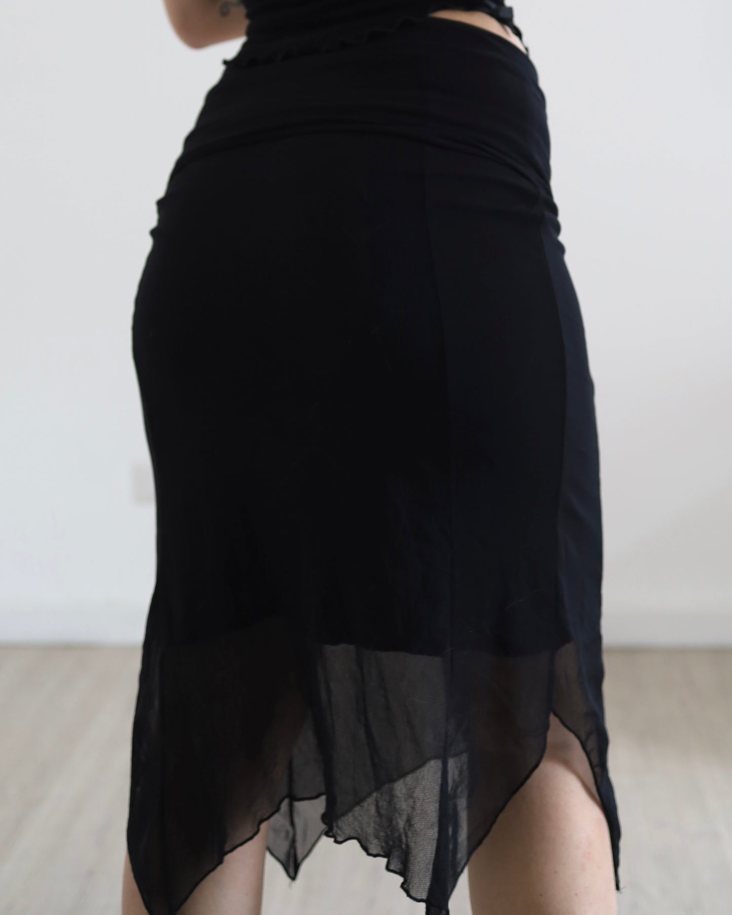 Asymmetric micro mesh skirt