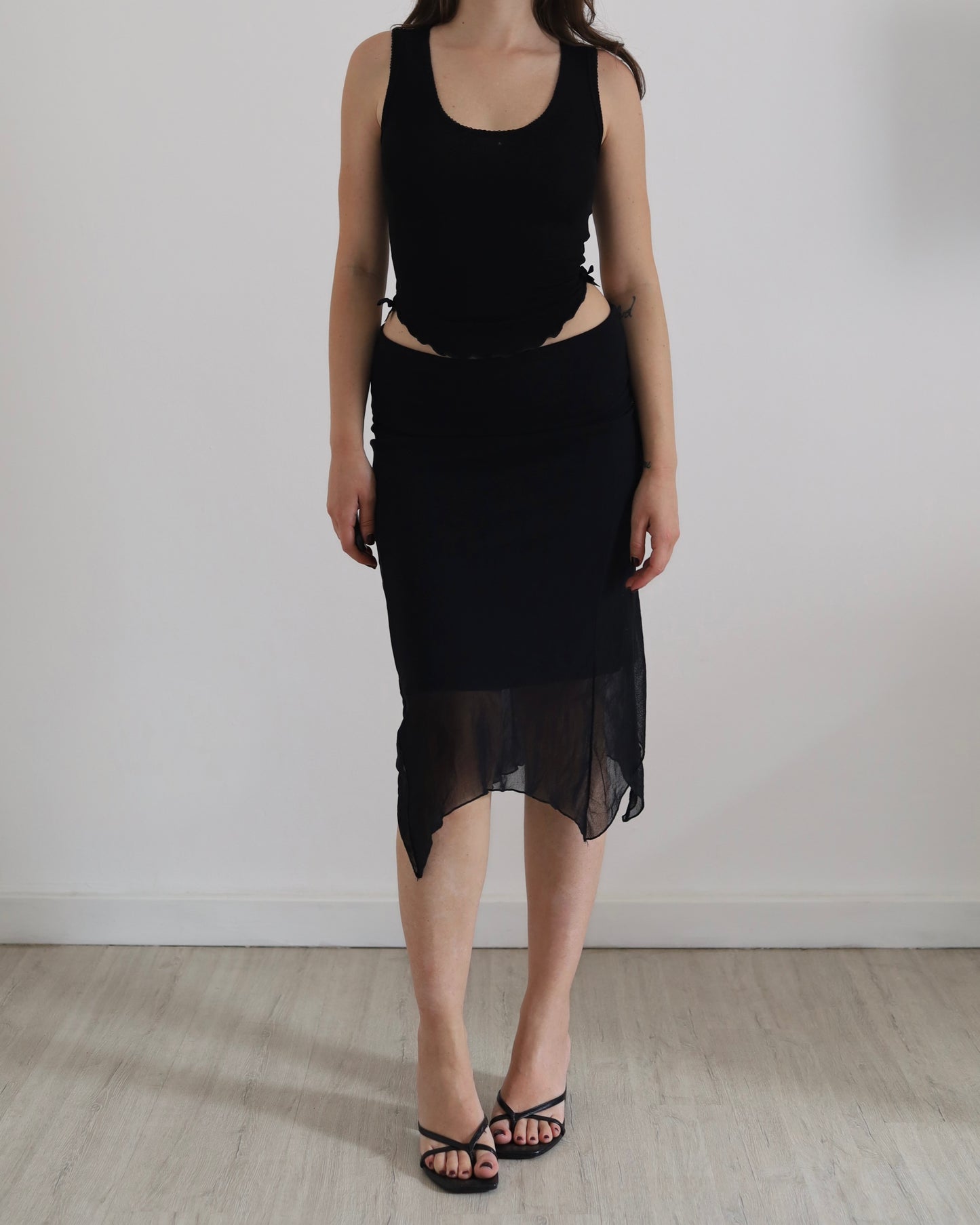 Asymmetric micro mesh skirt