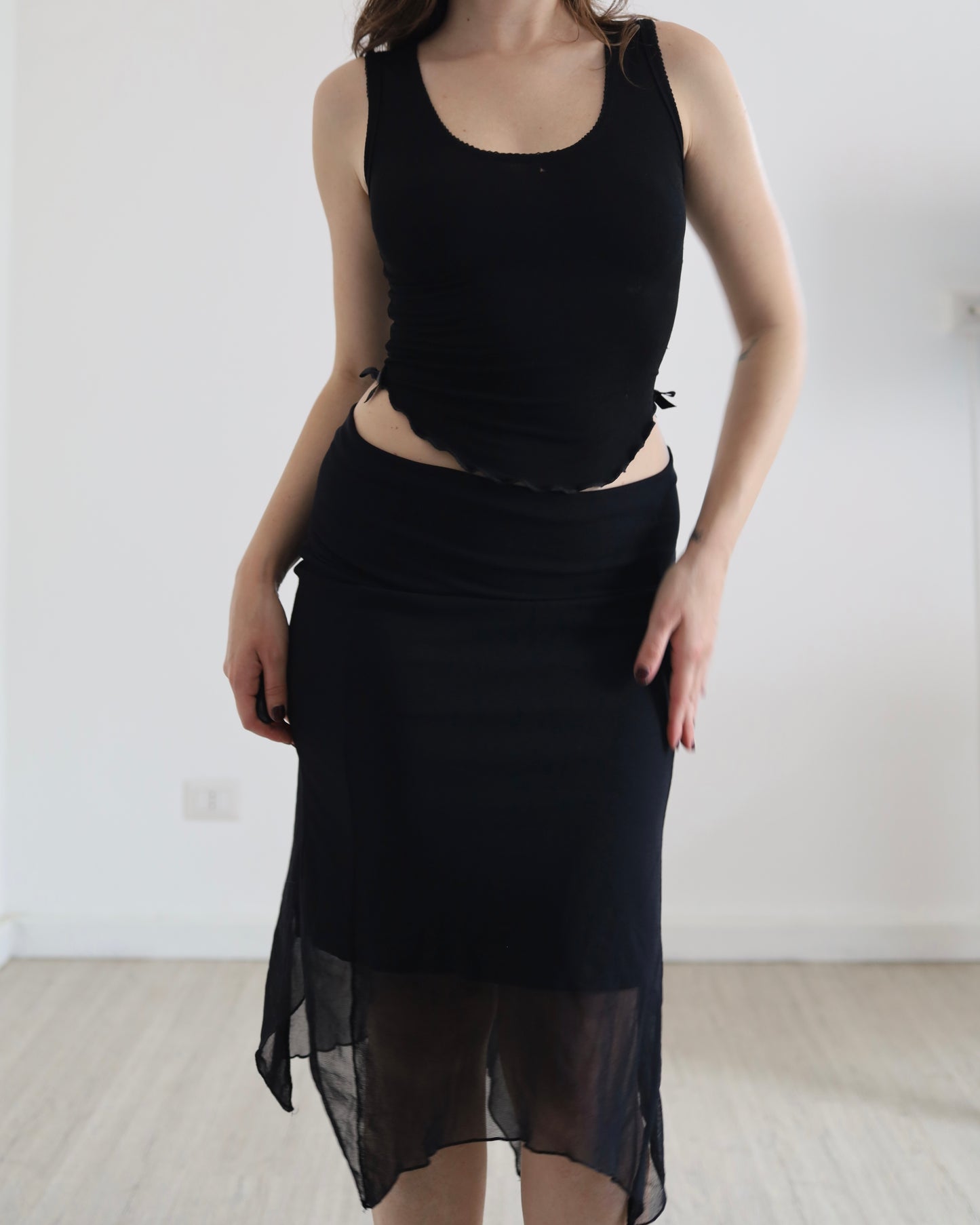 Asymmetric micro mesh skirt