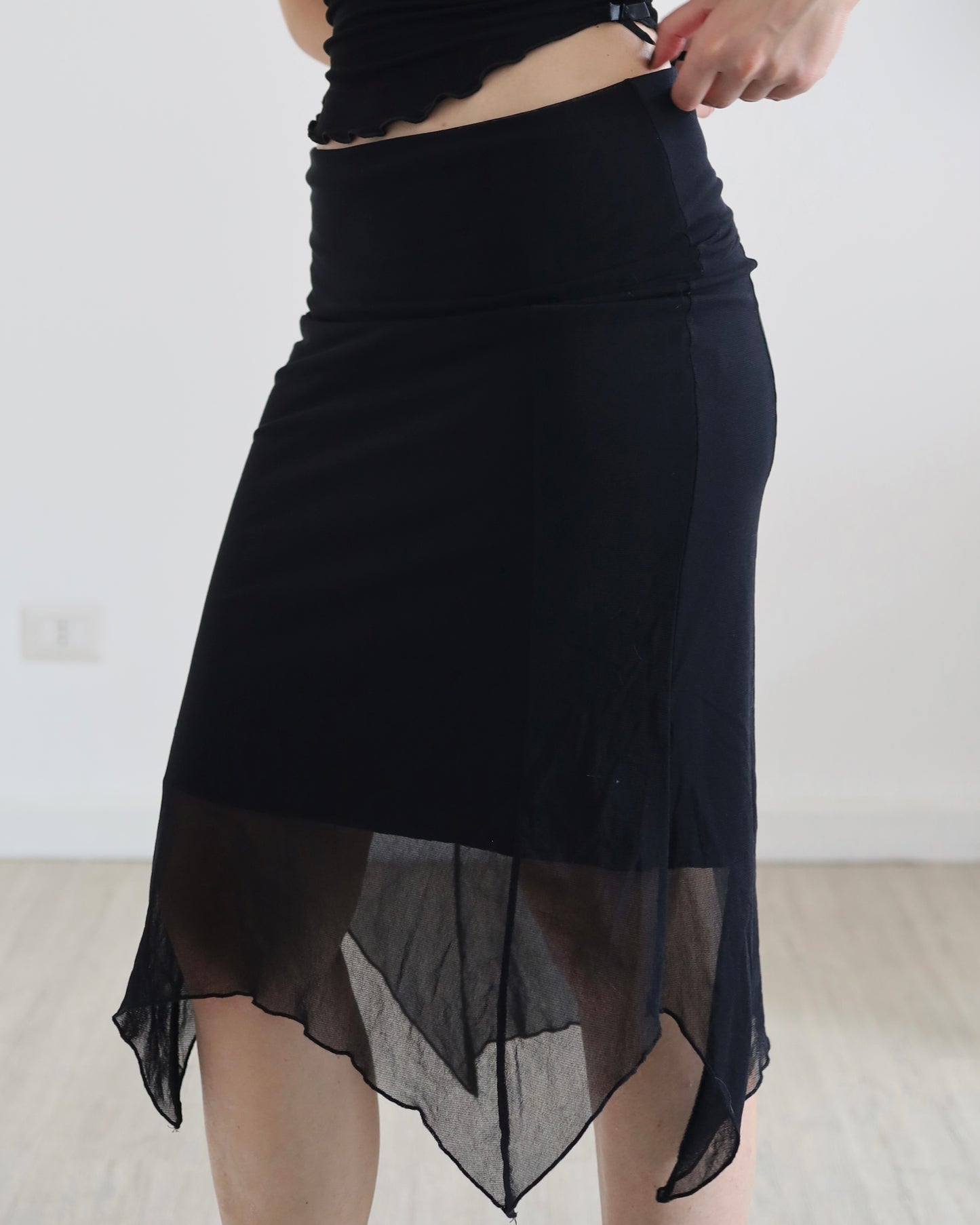 Asymmetric micro mesh skirt